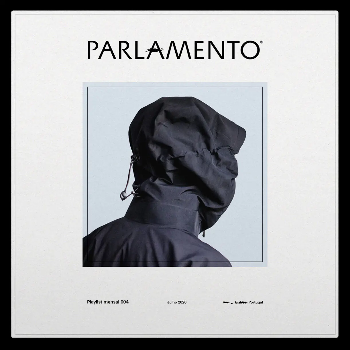 Magazine cover titled PARLAMENTO featuring a person wearing a black hooded jacket.