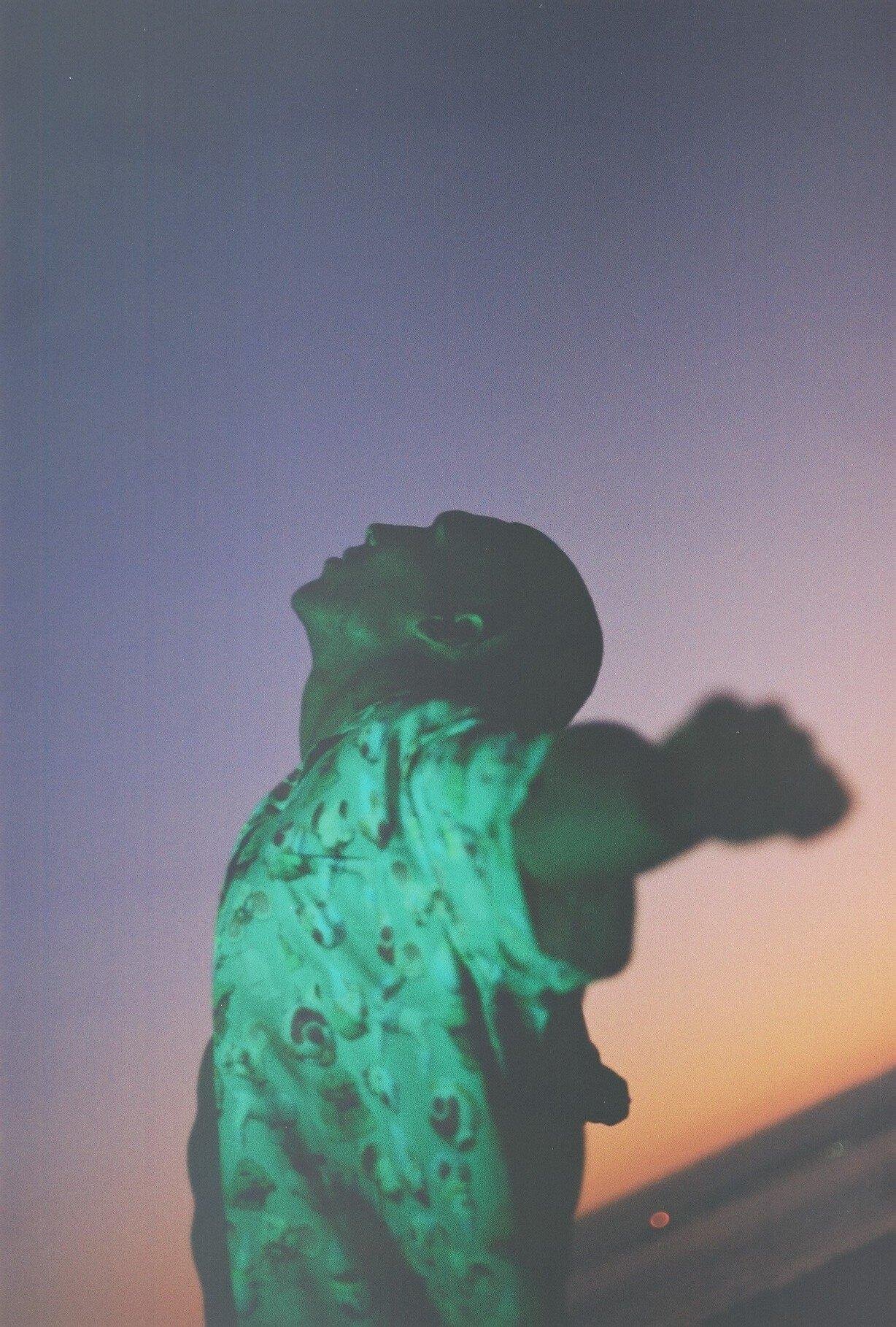 Man posing with open arms for Visual Installment 1