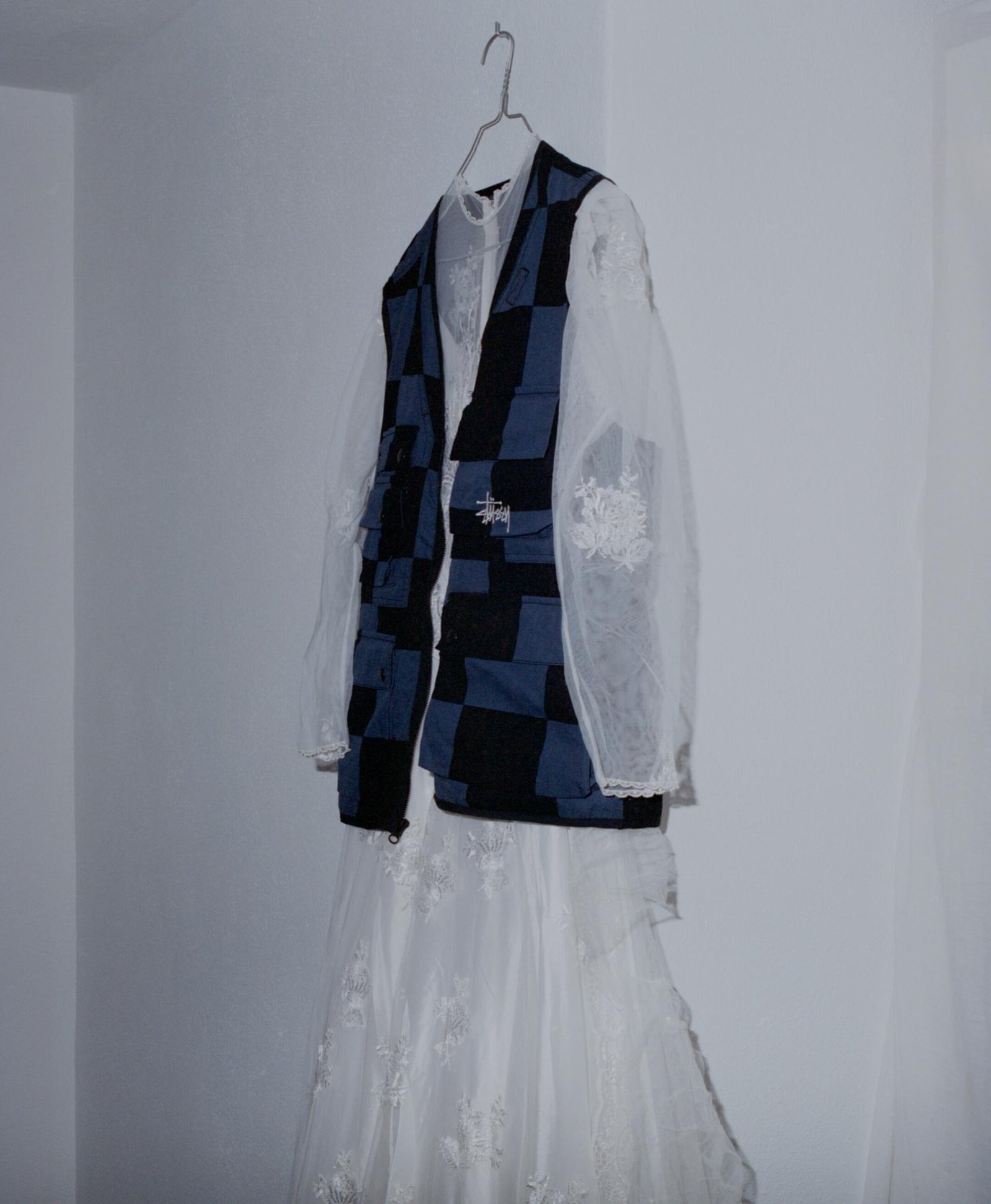Stussy vest over a wedding dress for Visual Installment 1.