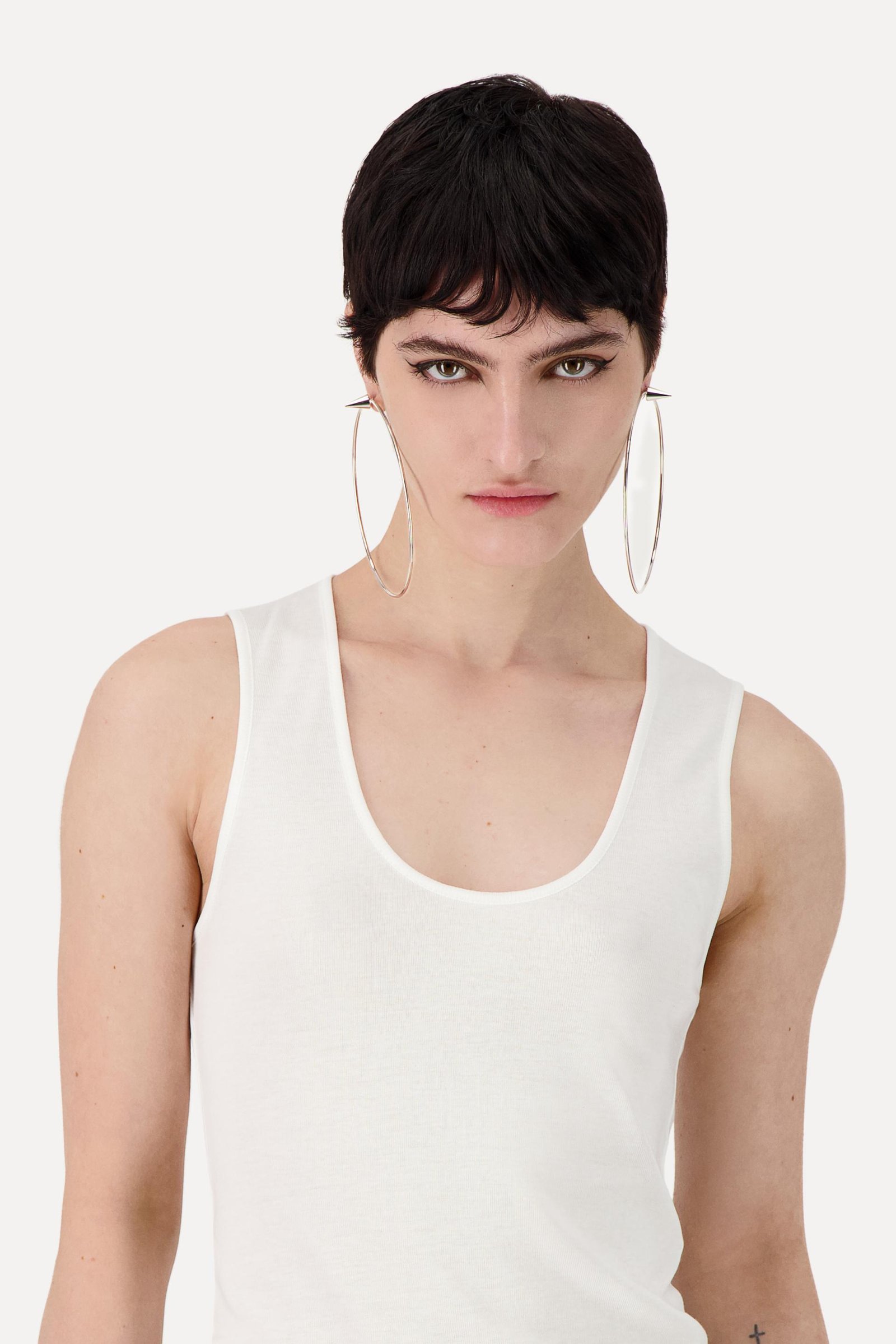 Front view of a person wearing the Justine Clenquet Sofia Earrings.