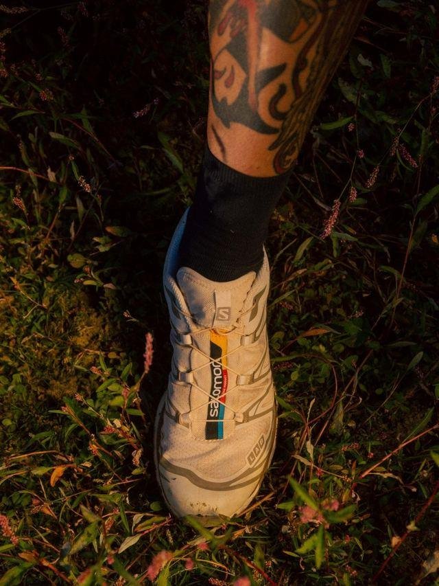 Detail of Salomon shoes for Visual Instalment 12.