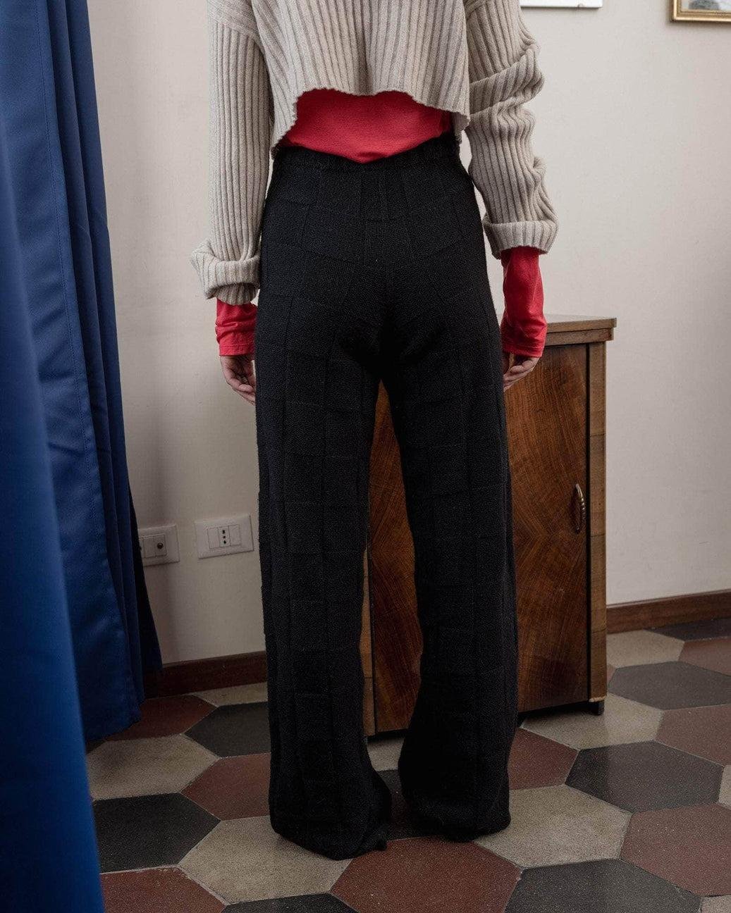 Model wearing the Baserange Konak Pants from the back.