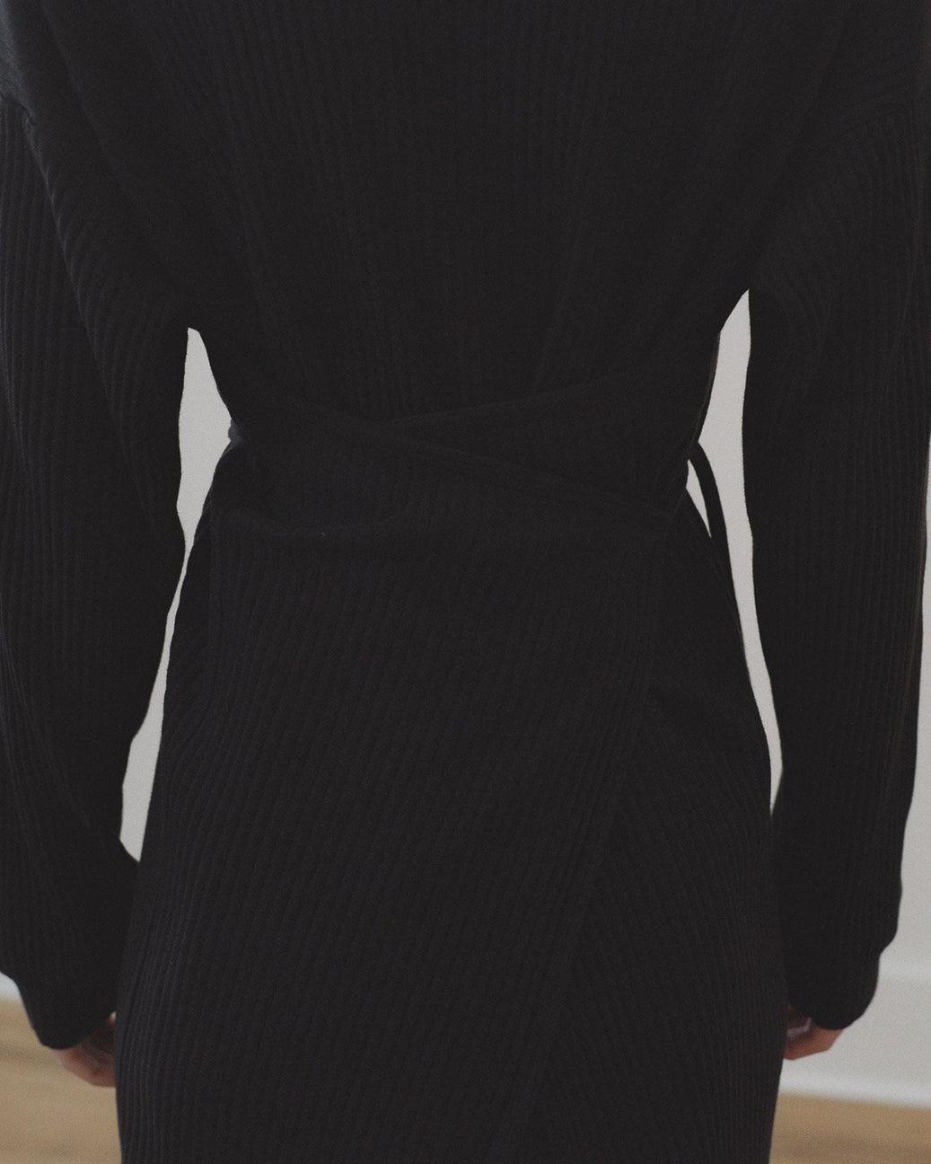 Baserange Shaw Kaftan in black back detail.