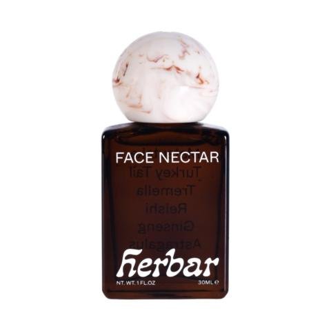 Herbar Face Nectar flask on a white background.