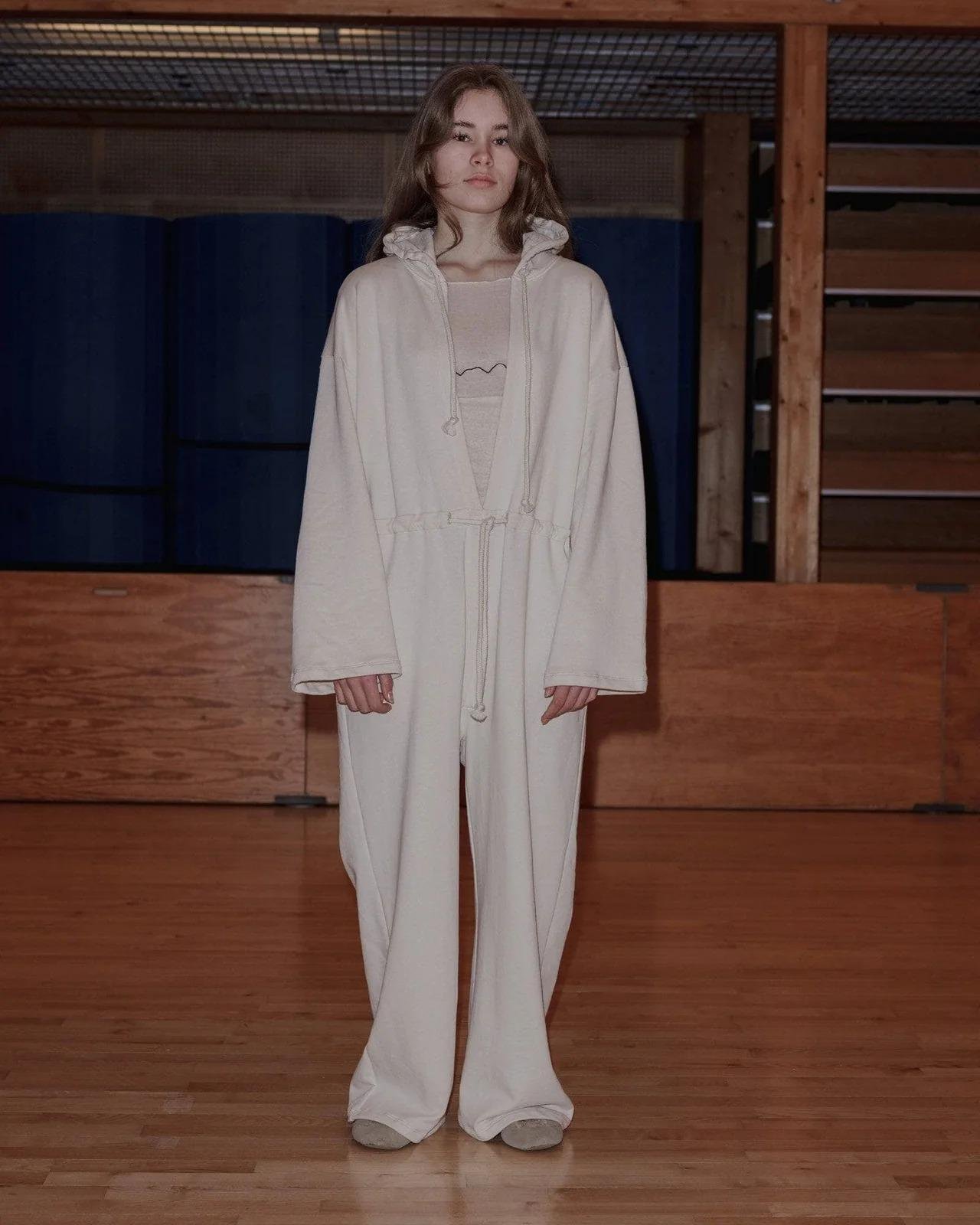 Model wearing the Baserange Ordu Jumpsuit Off-White from the front.