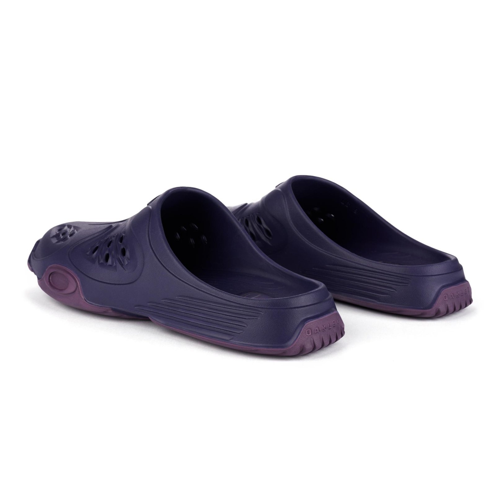 A pair of Oakley Factory Team Paguro Slides in Purple back.