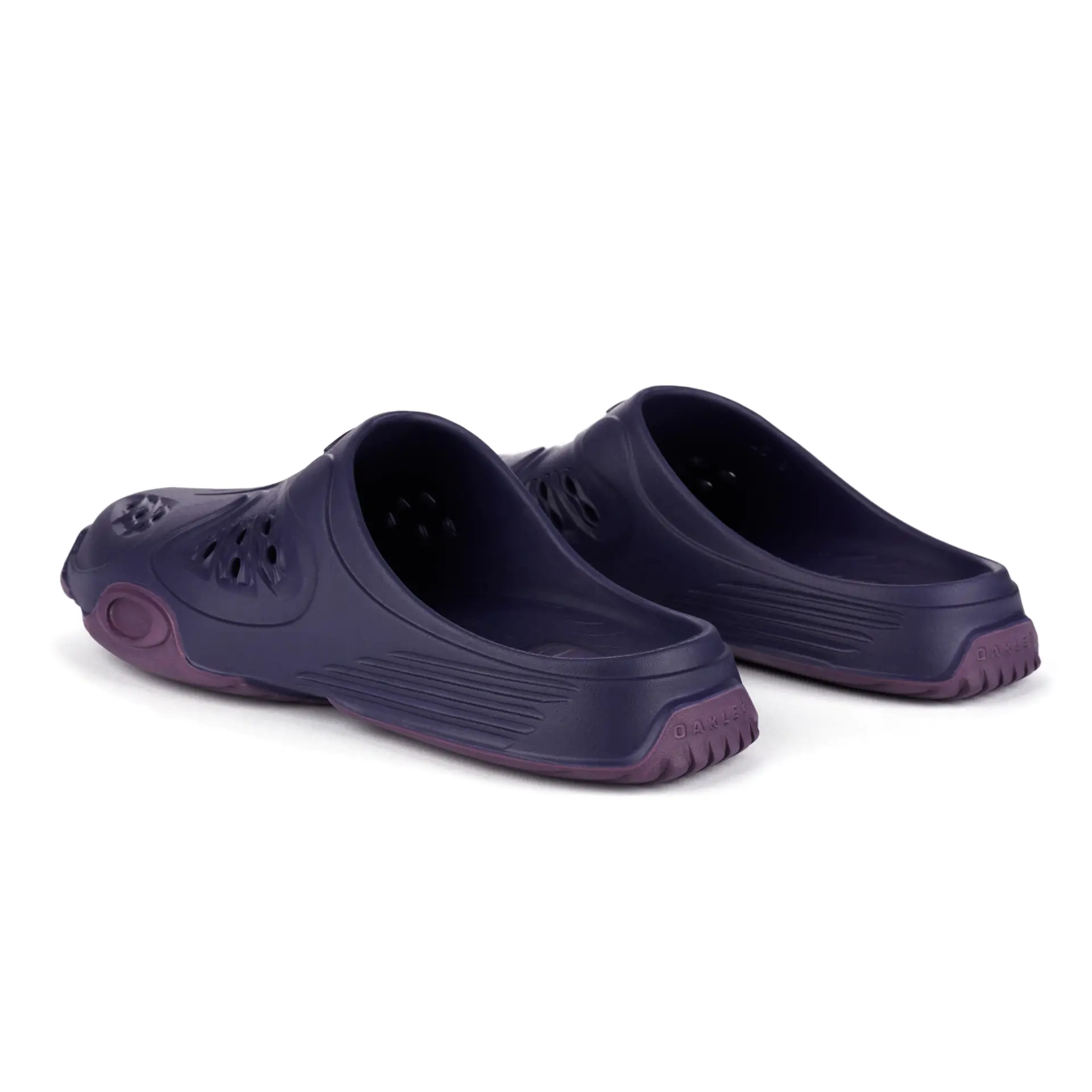 A pair of Oakley Factory Team Paguro Slides in Purple back.