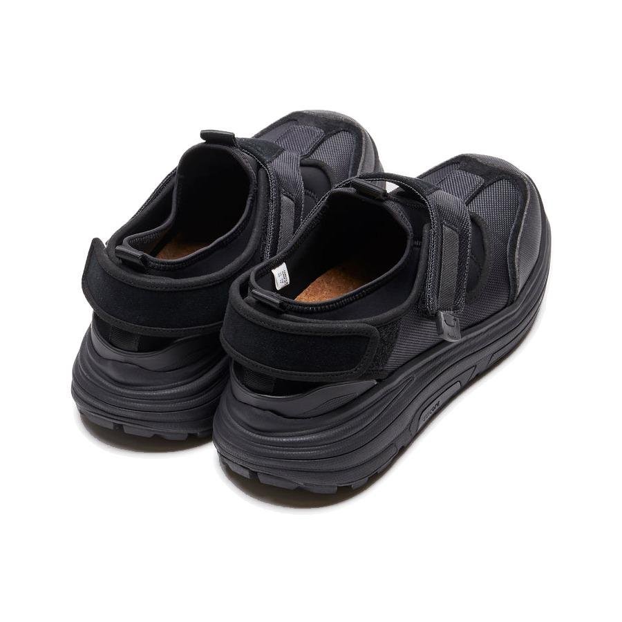 A pair of Suicoke Tred from behind