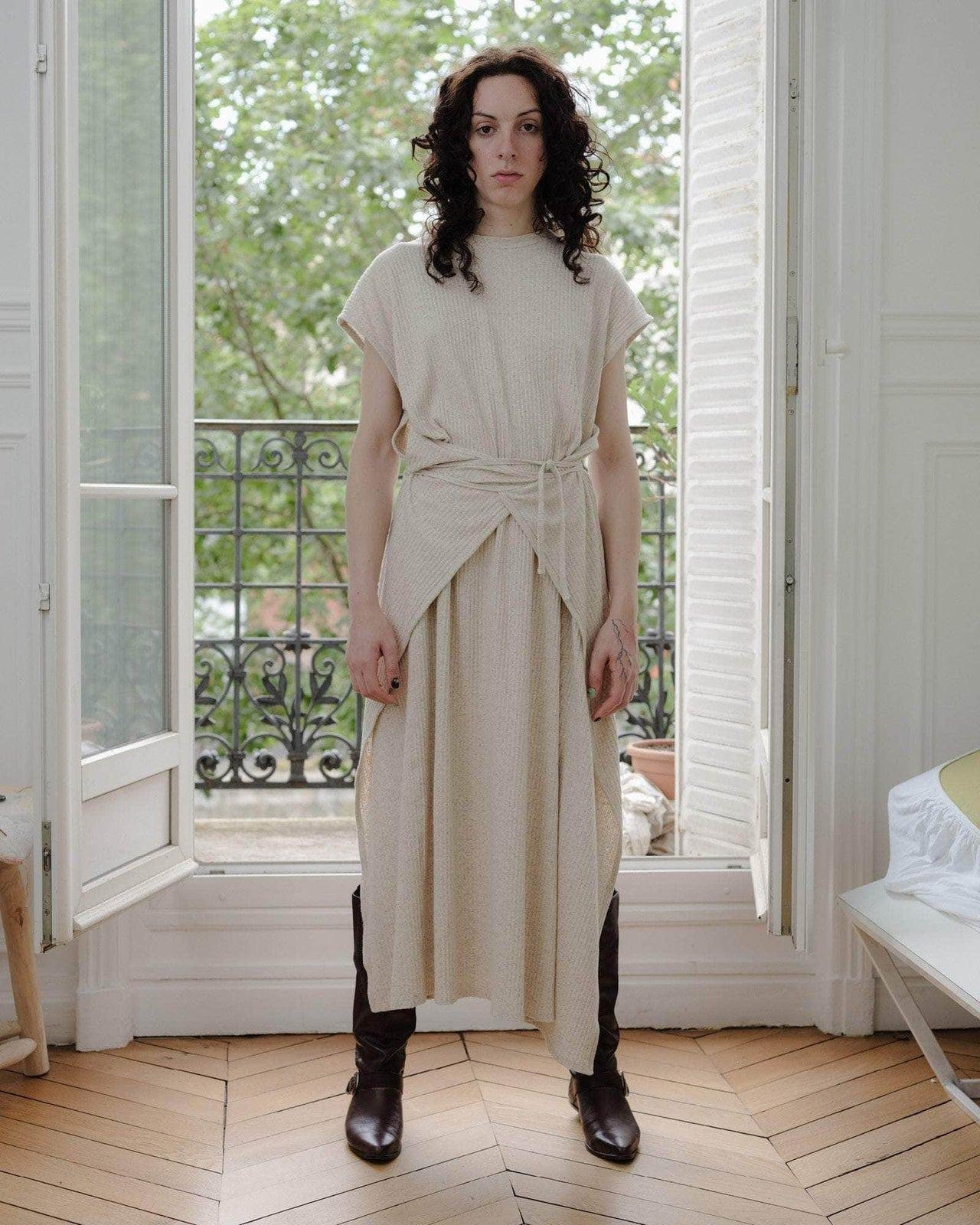 Model wearing the Baserange Shaw Sleeveless Dress from the front.