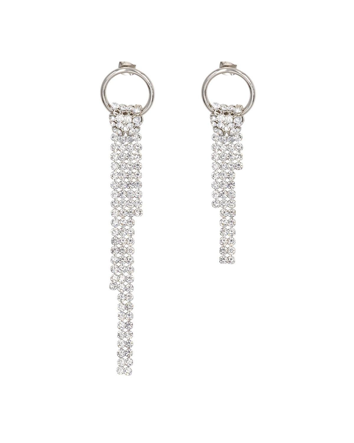 Justine Clenquet Shanon Earrings over a white background.