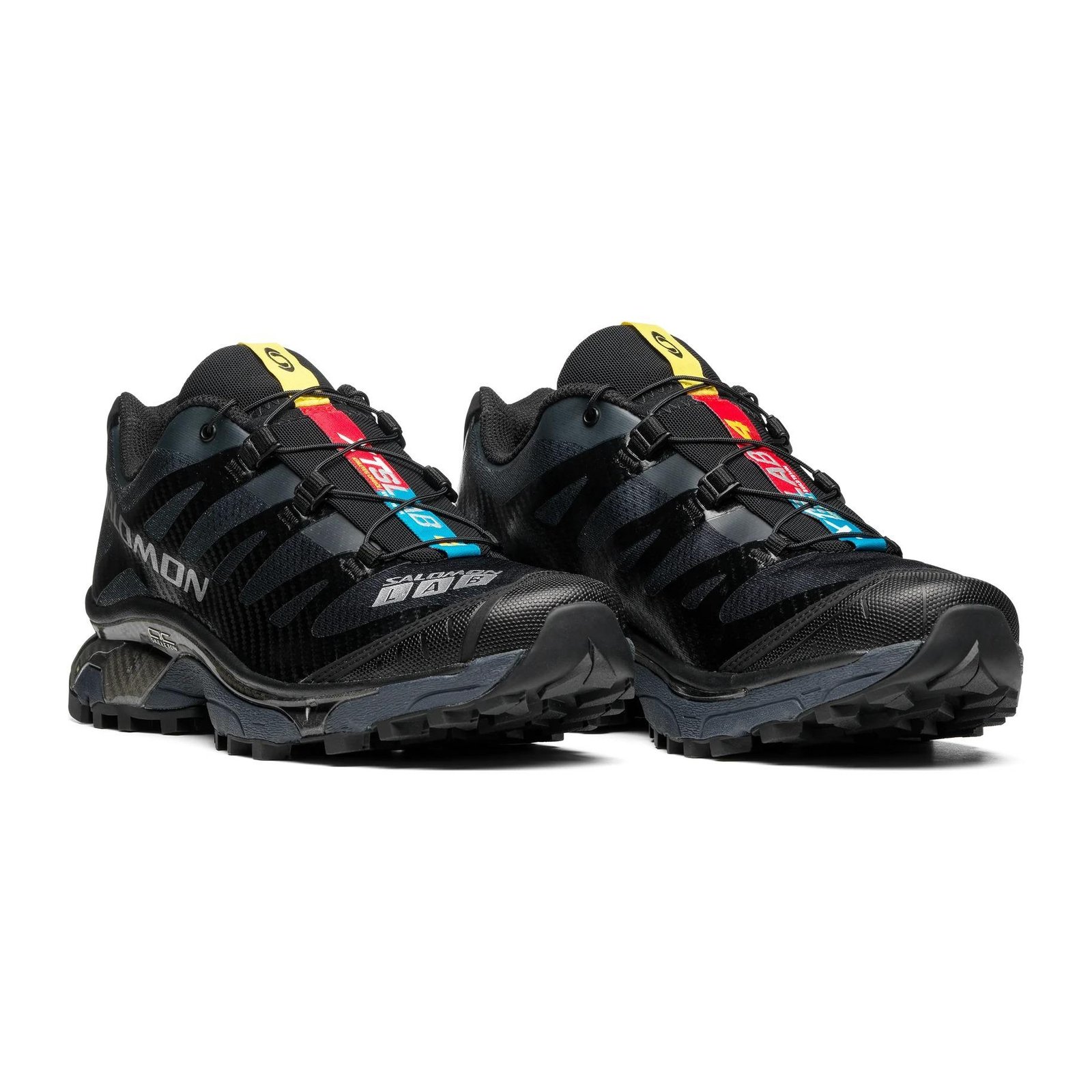 Salomon XT-4 OG Black/Ebony/Silver Metallic in a white background.