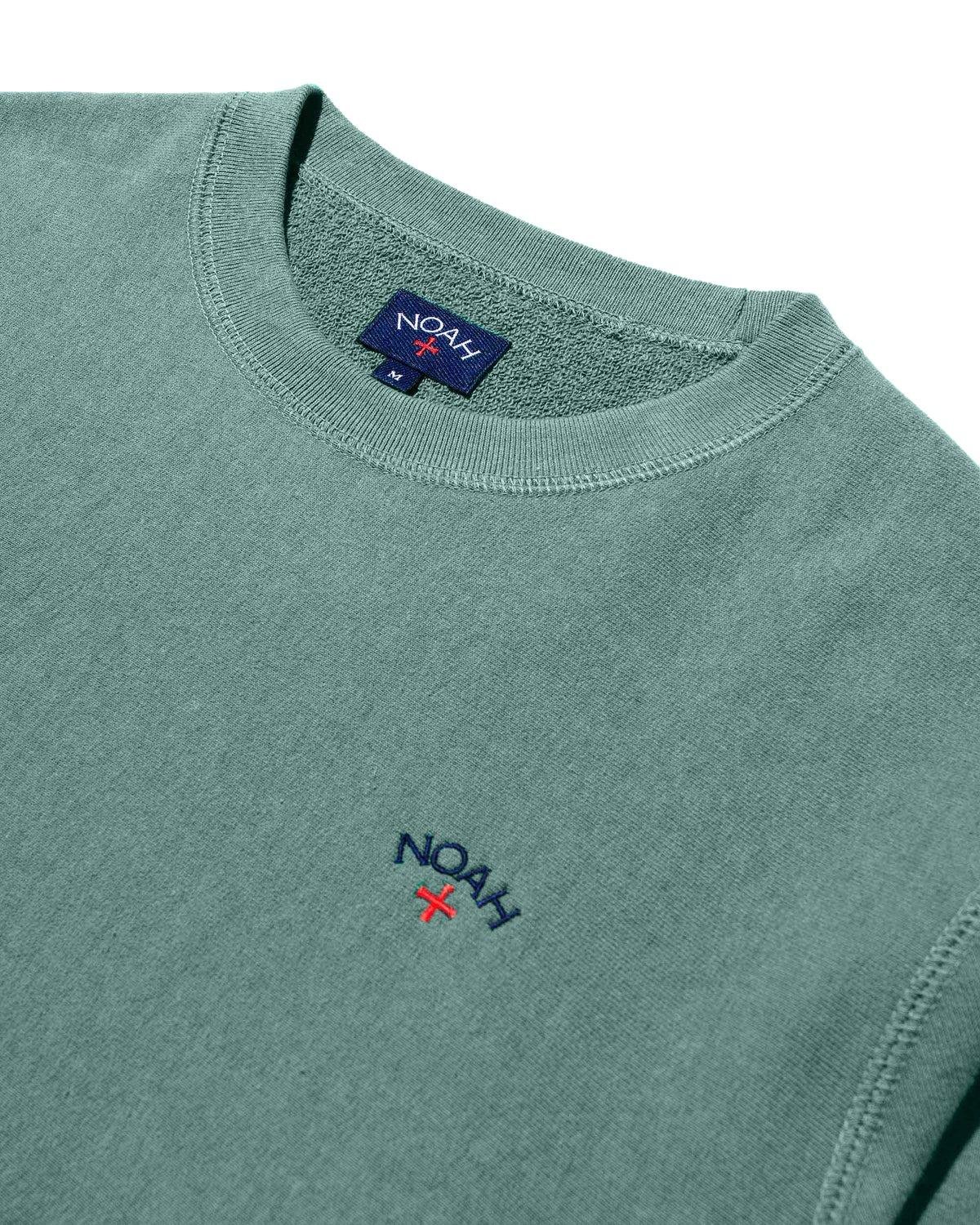 Detail of the Noah Classic Crewneck