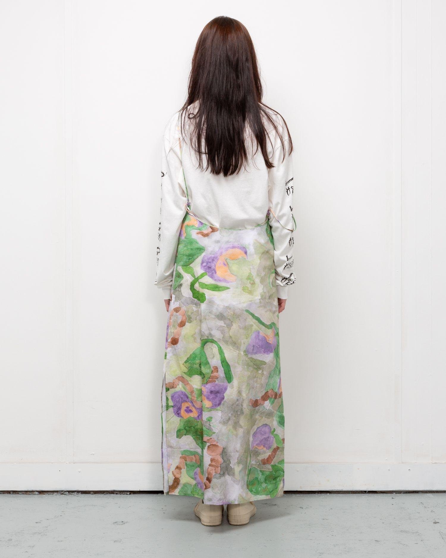 Person wearing the Heresy Annelida Strap Dress from the back.