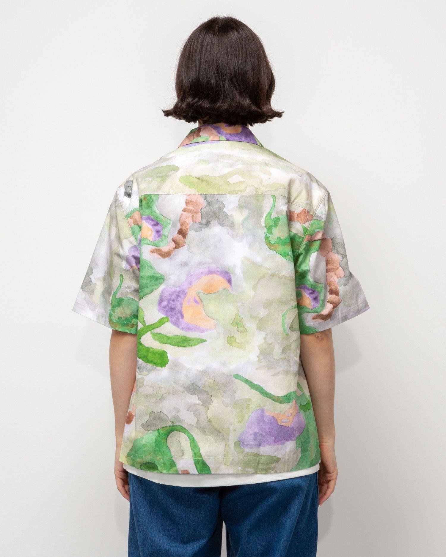 View of a person wearing the Heresy Annelida Shirt from the back.