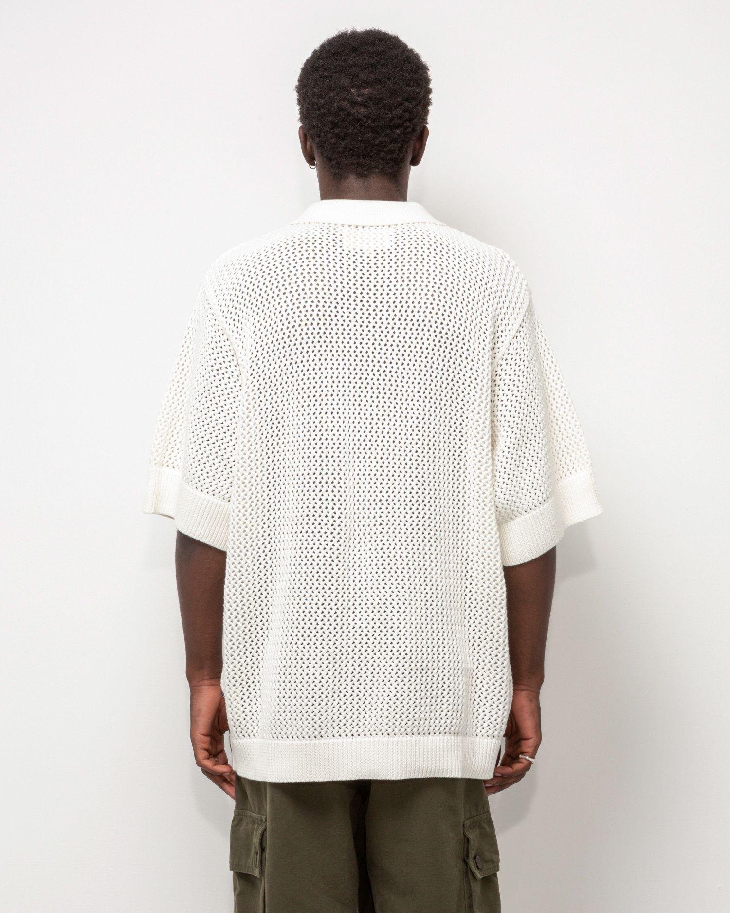 Person wearing the Heresy Braid Shirt from the back.