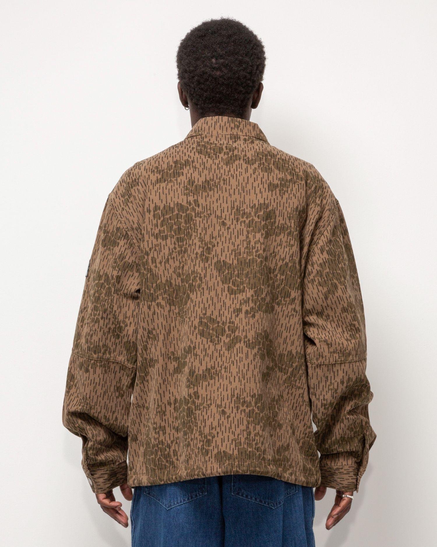 Person wearing the Heresy Drencher Jacket from the back.