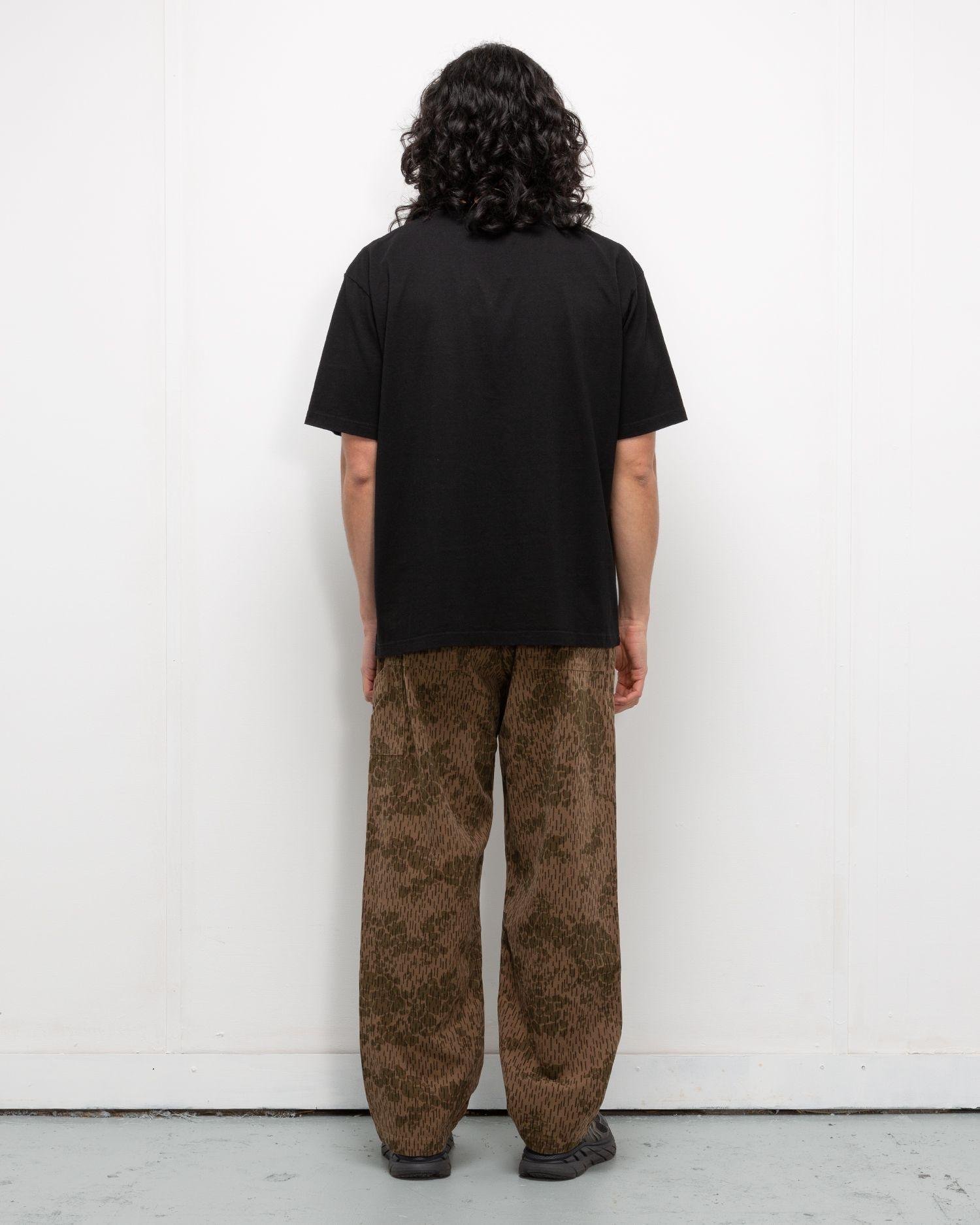 Person wearing the Heresy Drencher Trousers from the back.