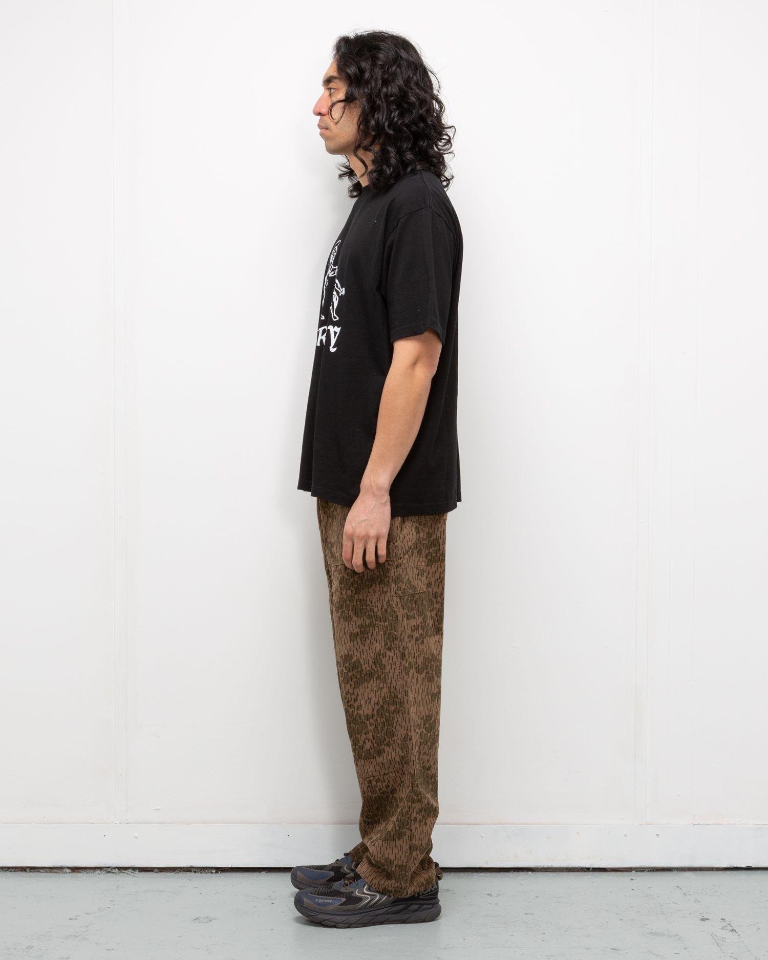 Person wearing the Heresy Drencher Trousers from the side