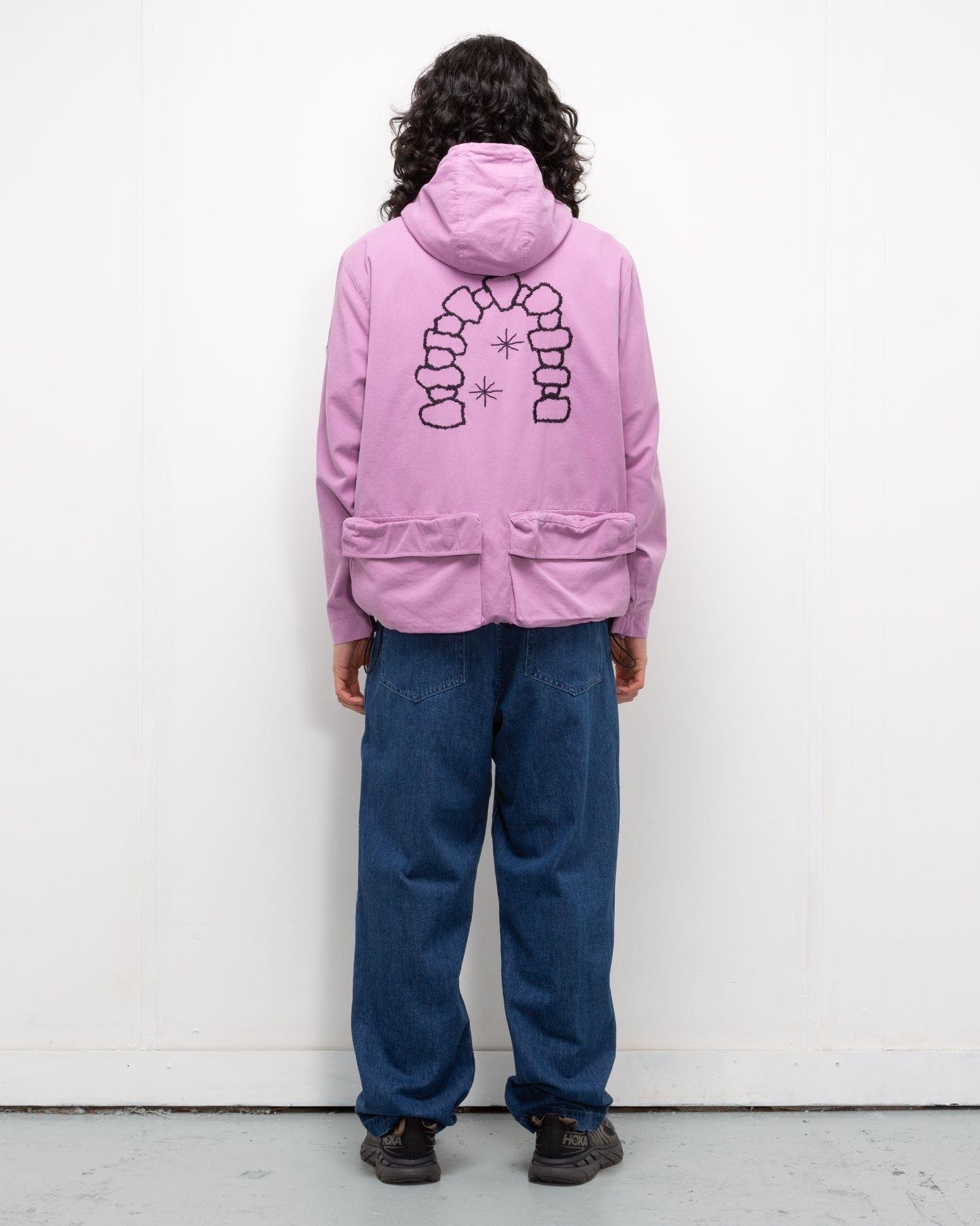 Person wearing the Heresy Excursion Jacket from the back.