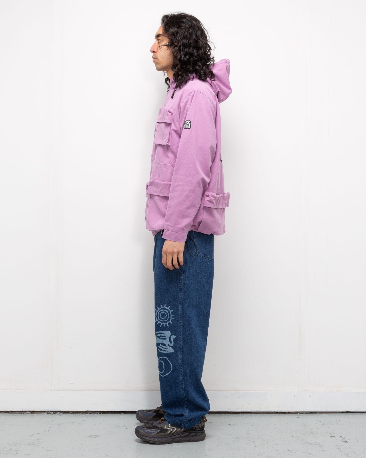 Person wearing the Heresy Excursion Jacket from the side.