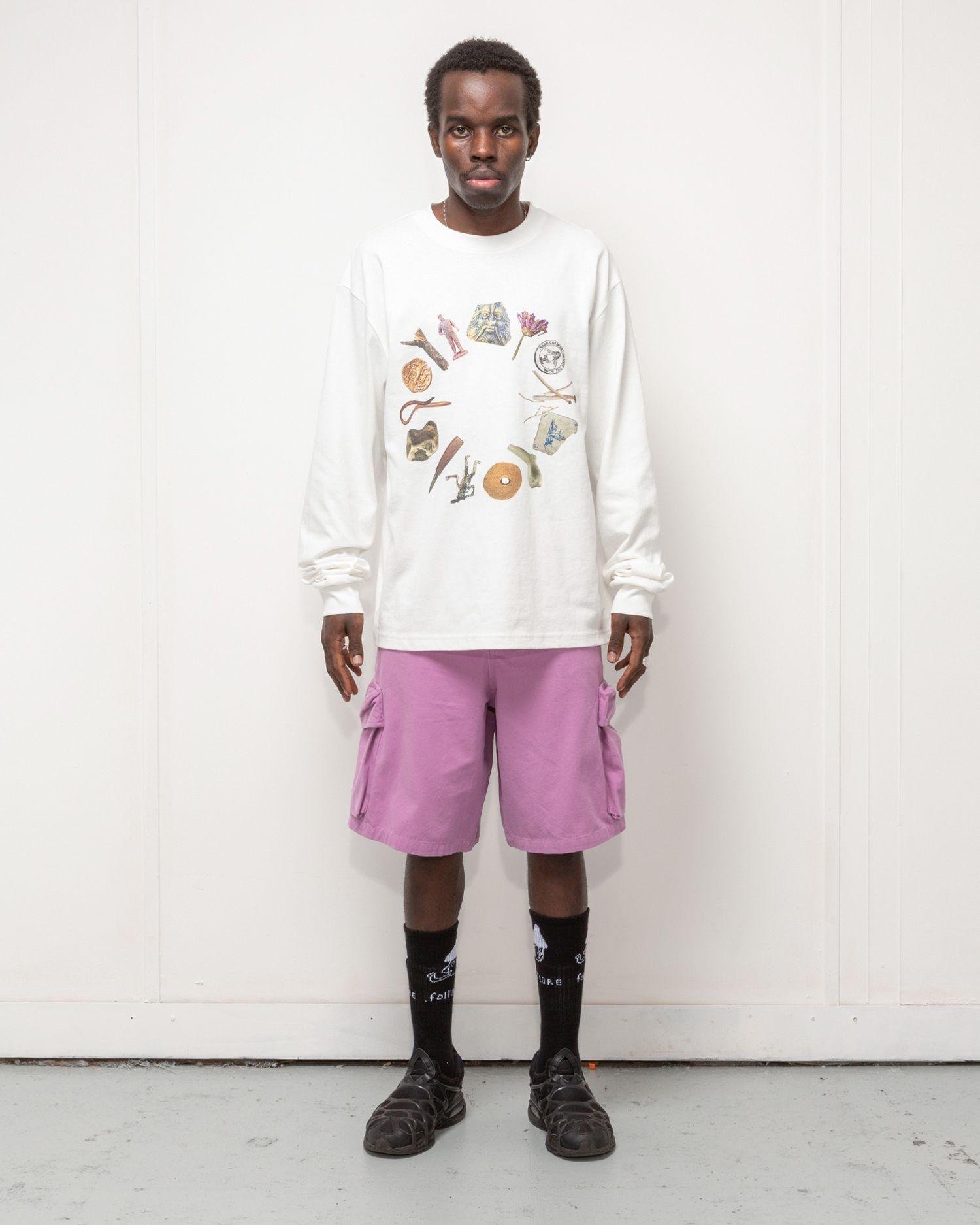 Person wearing the Heresy Excursion Shorts from the front.