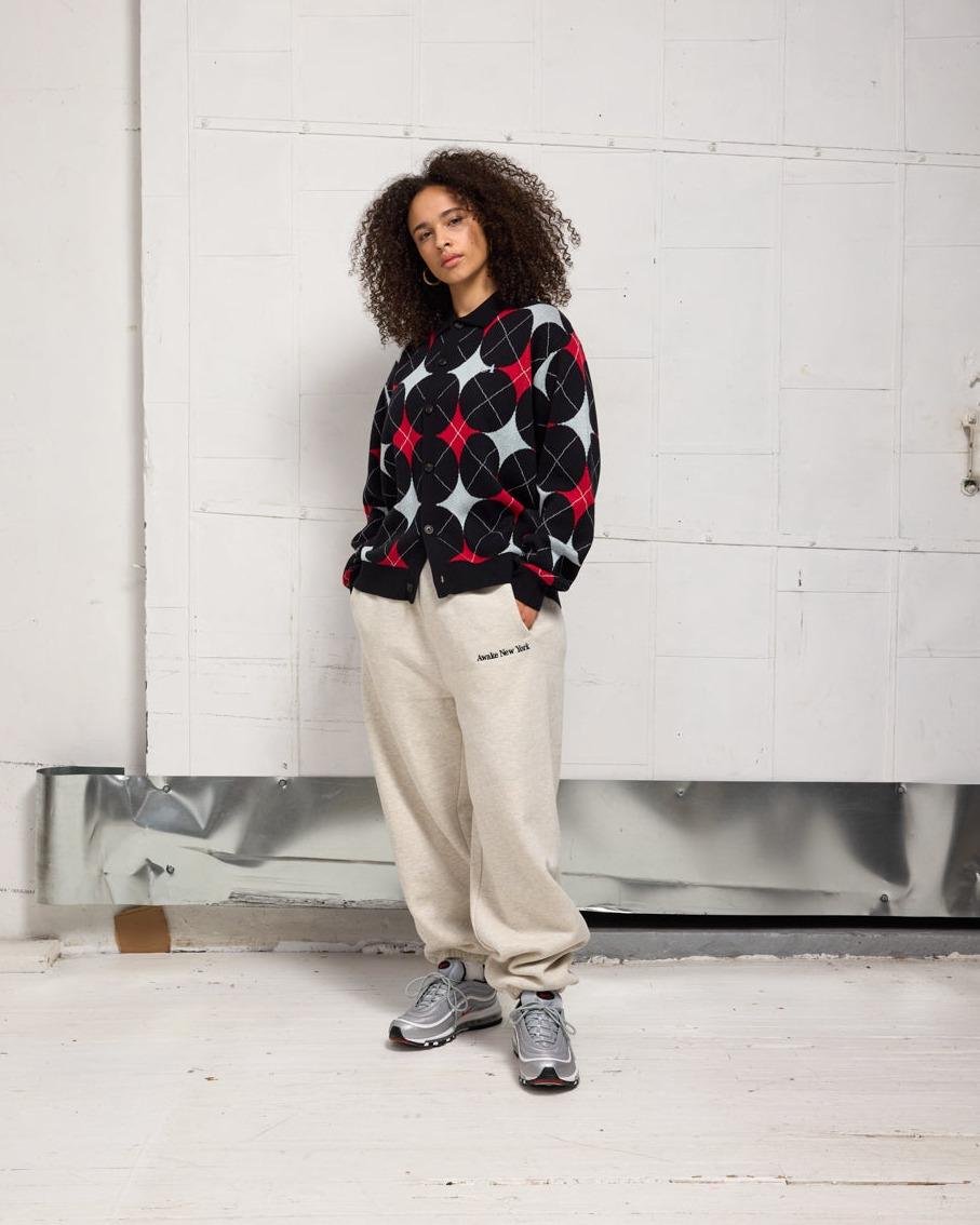 Woman wearing a cardigan and sweatpants for the awake NY lookbook Spring24