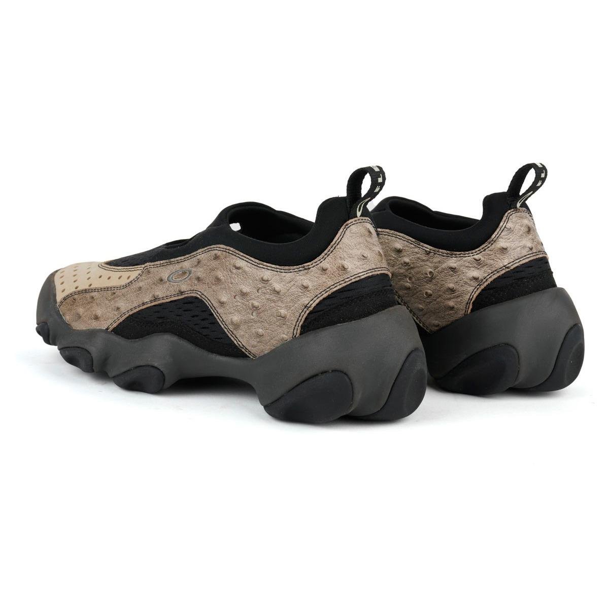 A pair of Oakley Factory Team Flesh Sandal back
