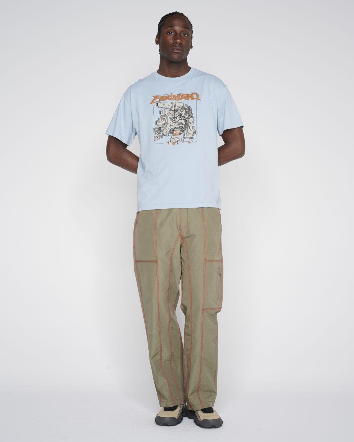male model wearing the Brain Dead Triple Needle Bishop Pant front
