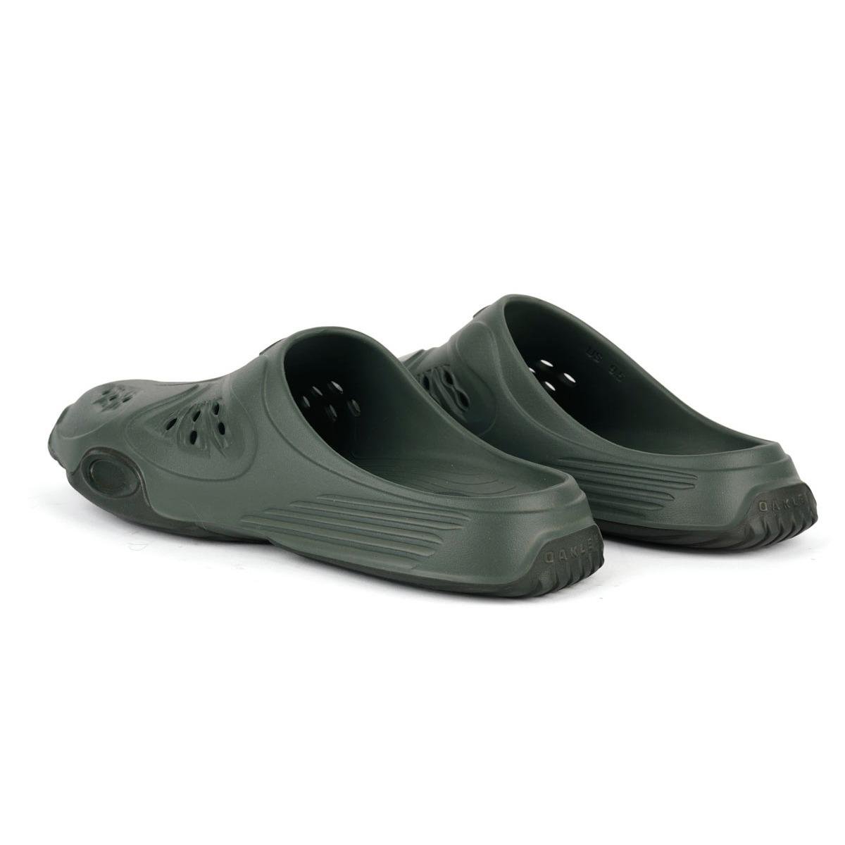 A pair of Oakley Factory Team paguro Slide in Climbing Ivy from the back.