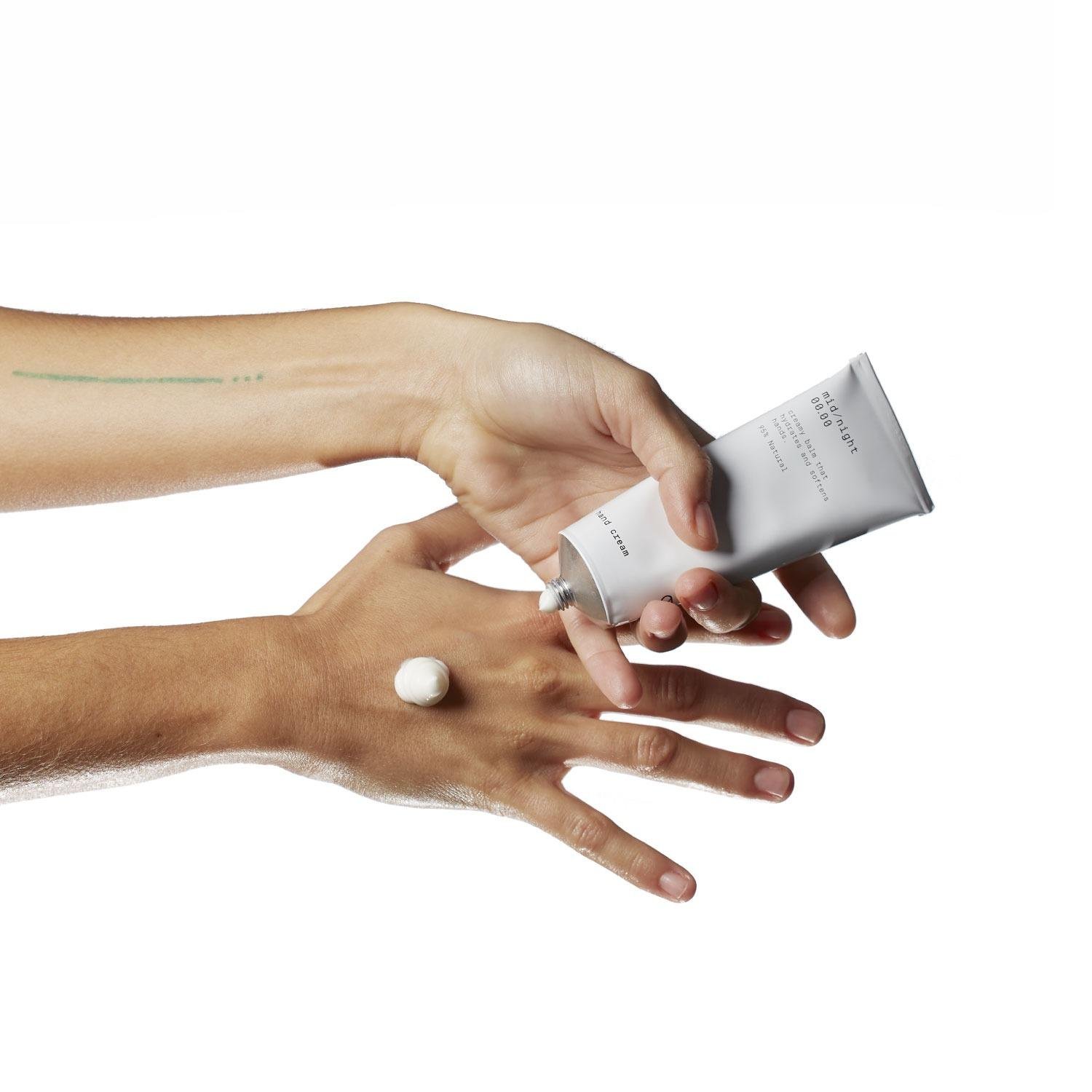 model using the Midnight 00.00 Hand Cream 00.16