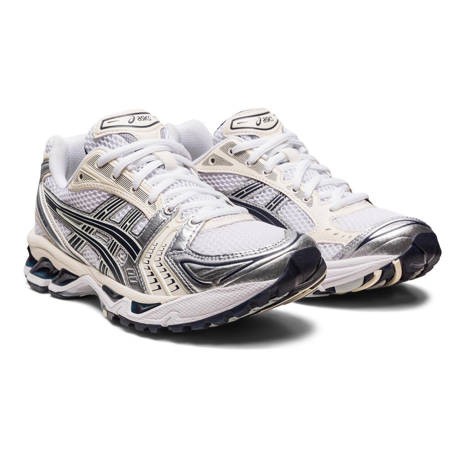 A pair of Asics Gel-Kayano 14 White/Midnight from the front.