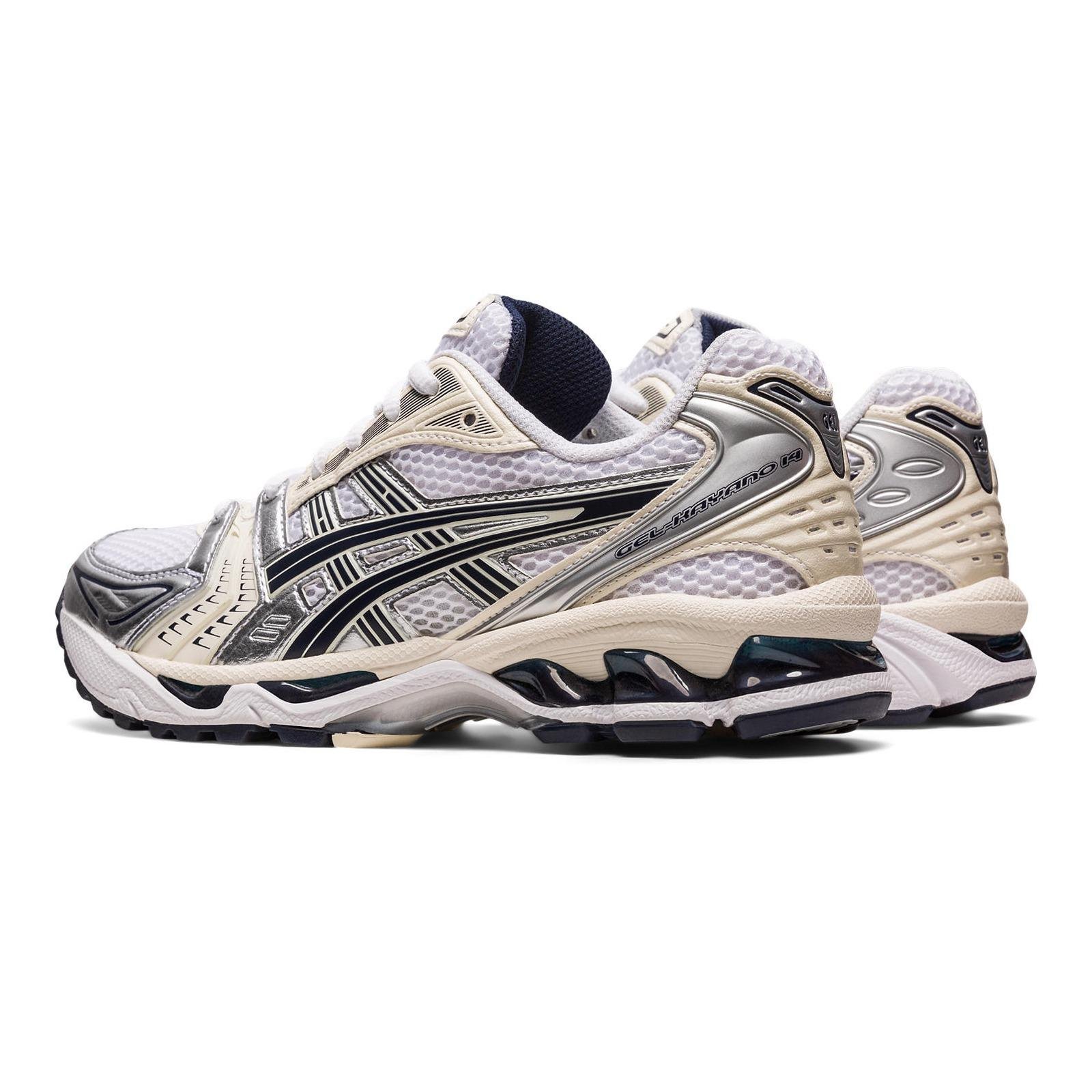 A pair of Asics Gel-Kayano 14 White/Midnight from the back.