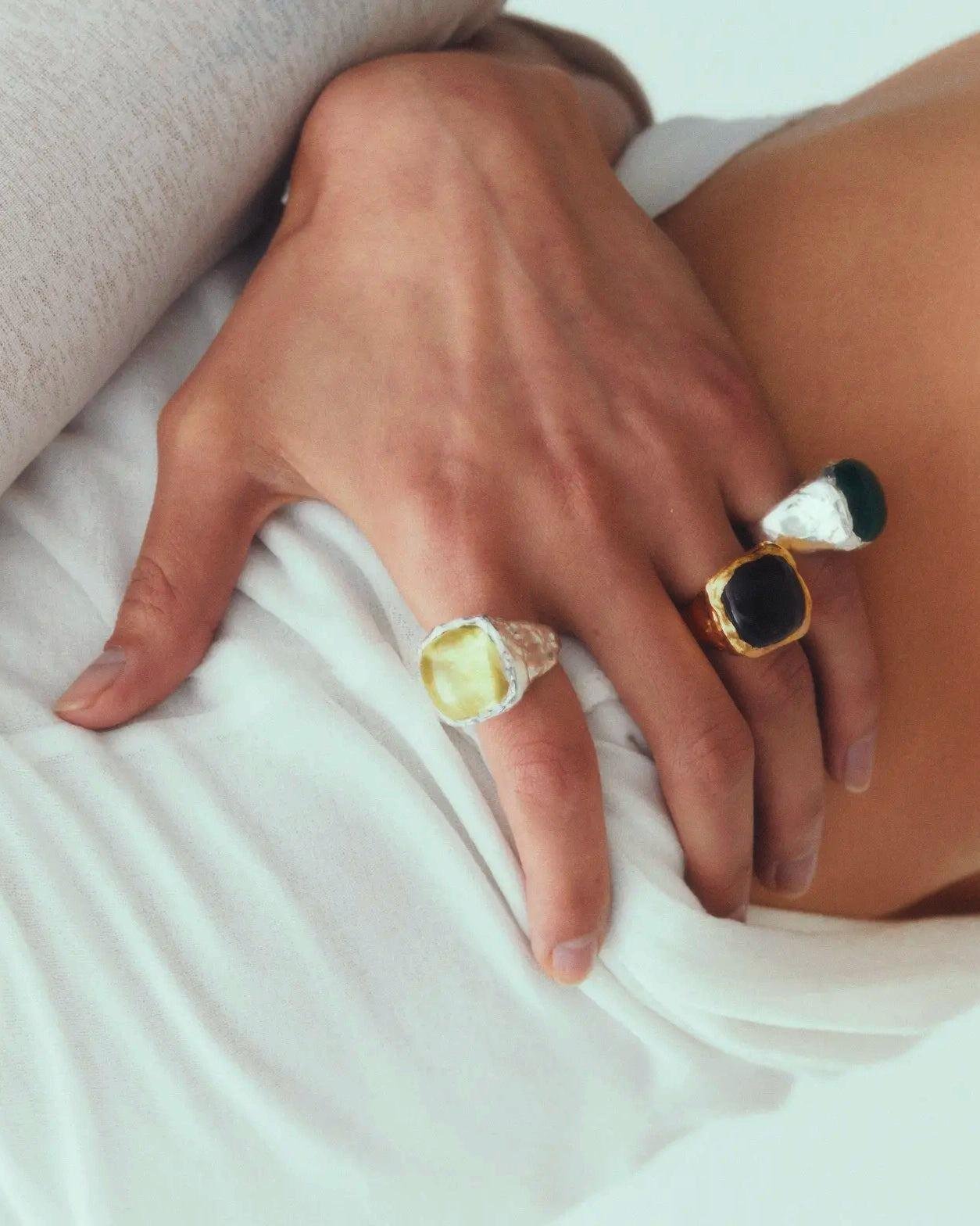 Simuero Boya Yellow Ring on the finger from afar.