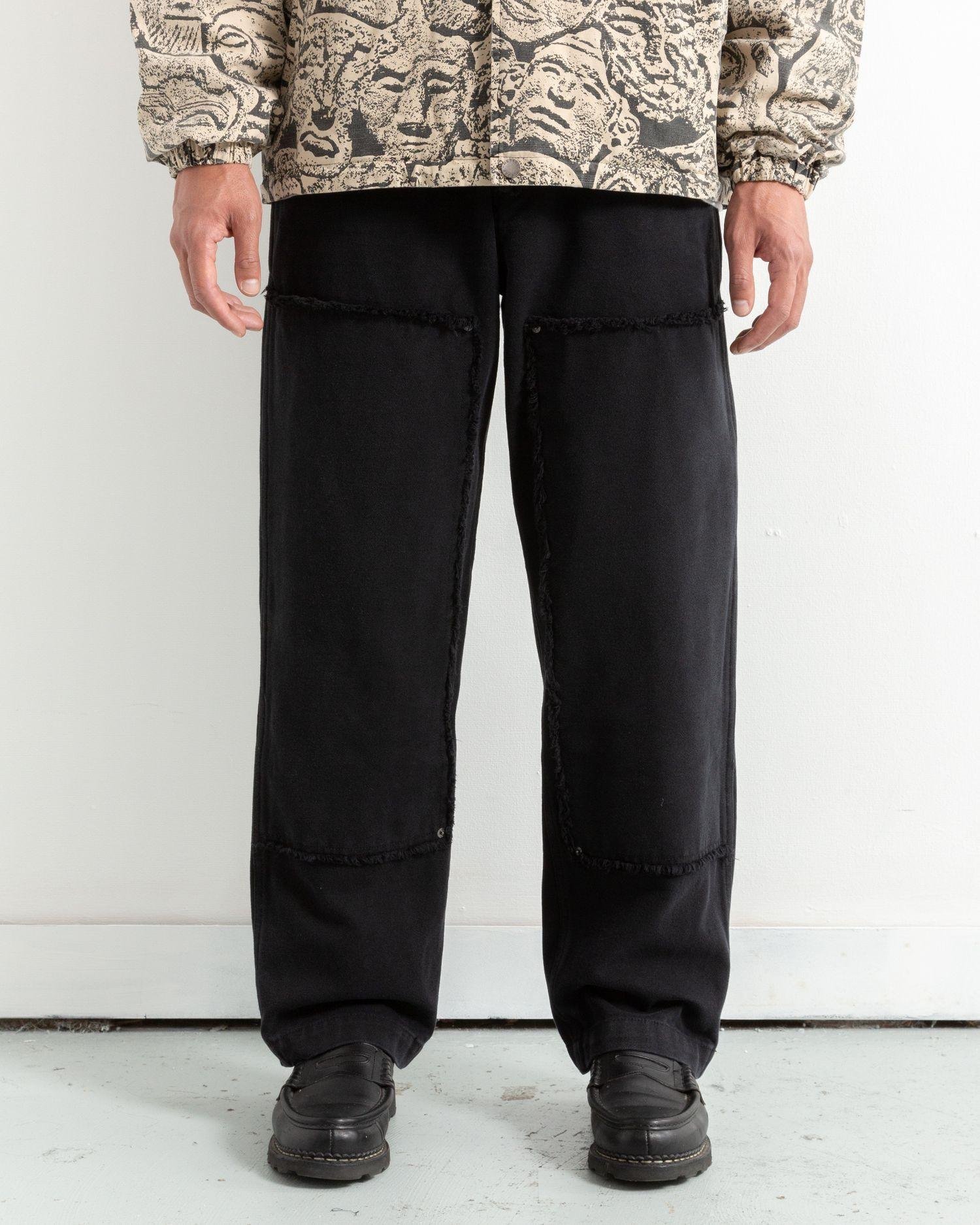 Heresy Scraggy Trousers Black with model front