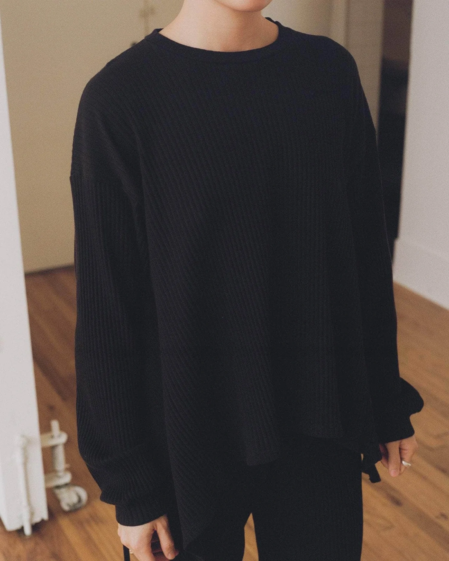 Baserange Shaw Long Sleeve Black front view on model