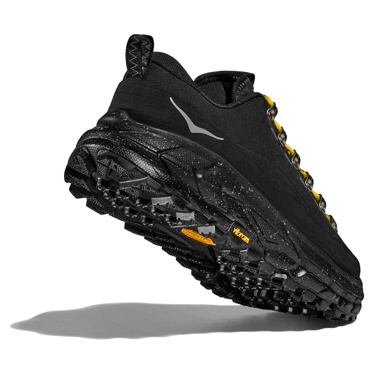 Hoka Tor Summit Black back bottom view in a white background