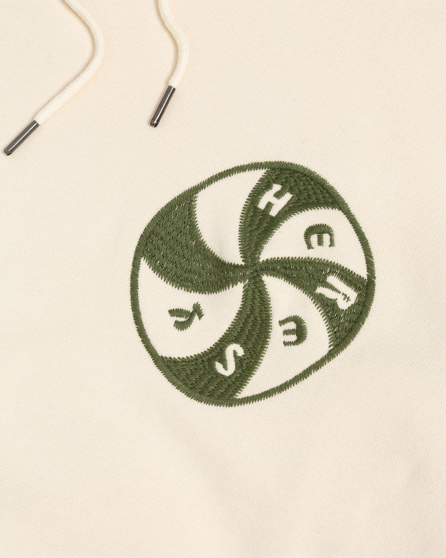 Detail of the Heresy Portal Hood print logo.