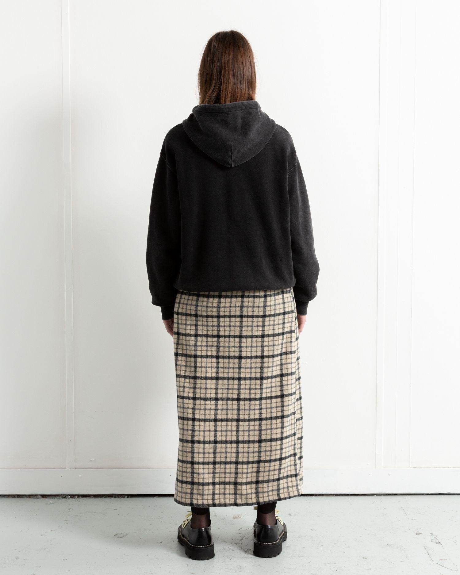 A person wearing the Heresy Steady Skirt from the back.