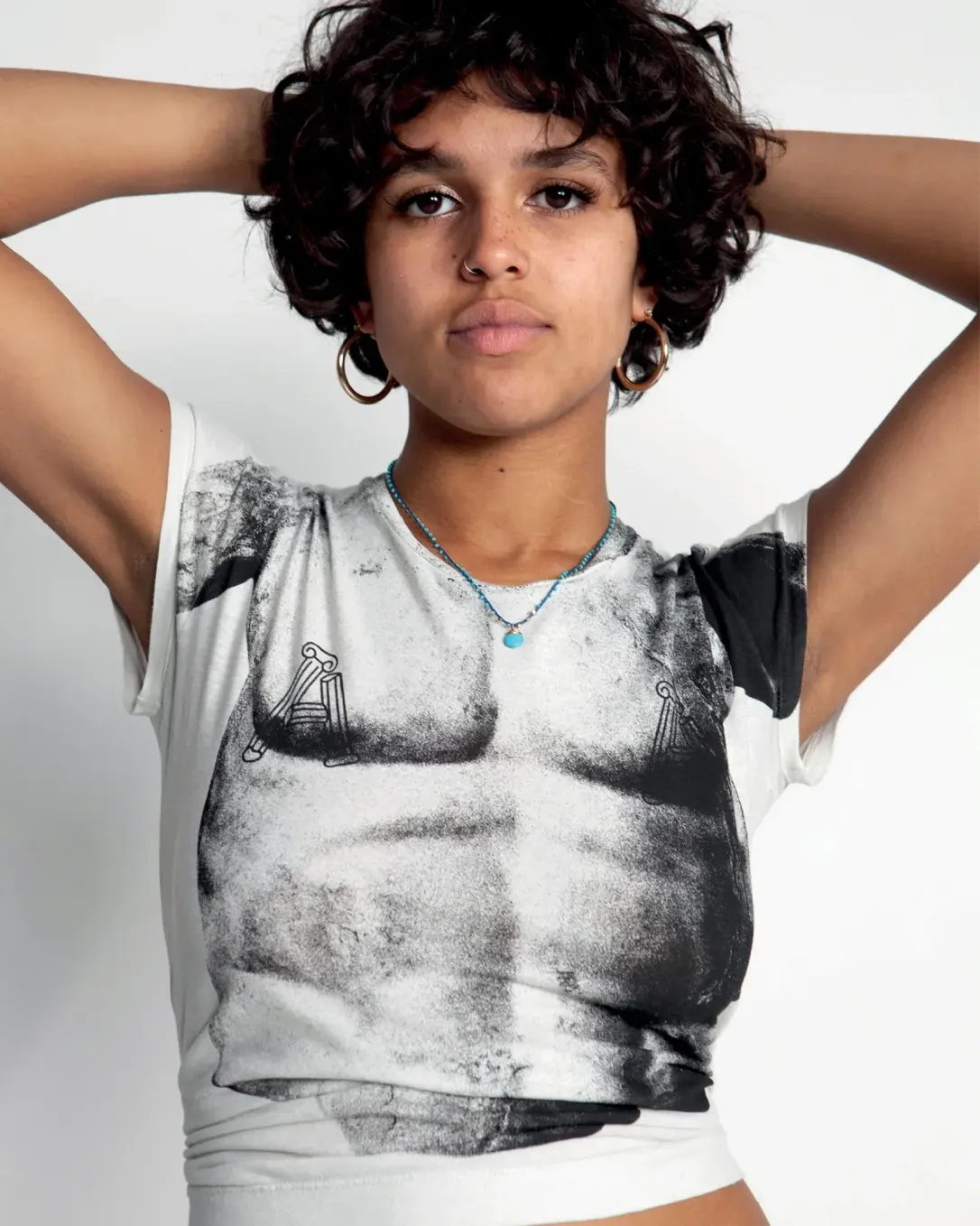 Aries Temple Torso Cap Sleeve Tee front view on model