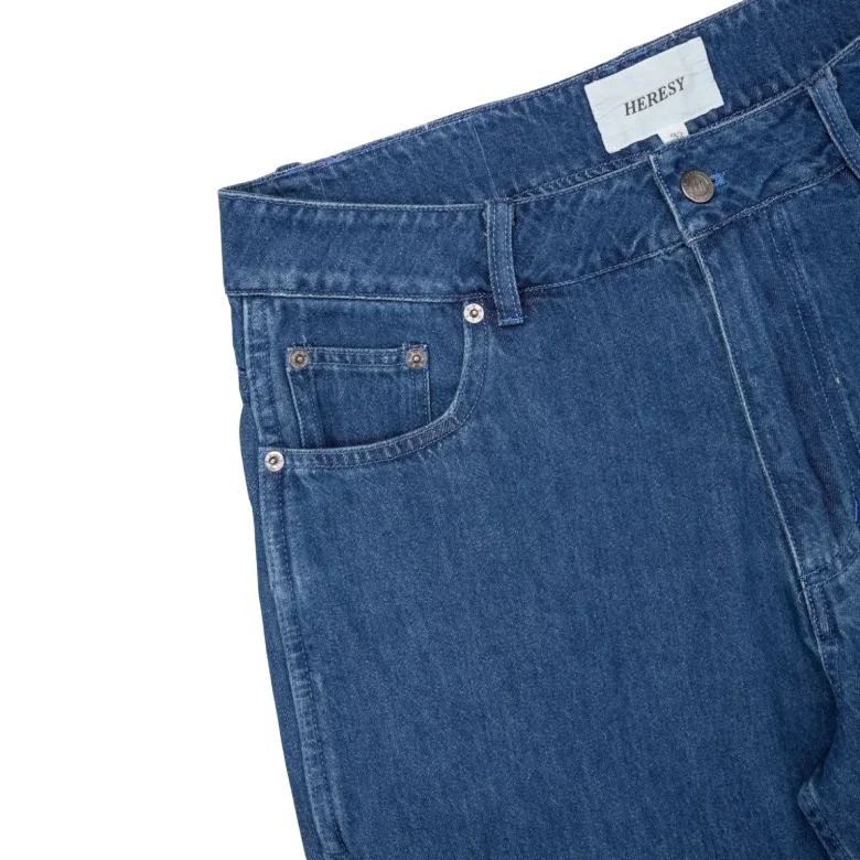 Heresy Primitive Jeans front view detail in a white background