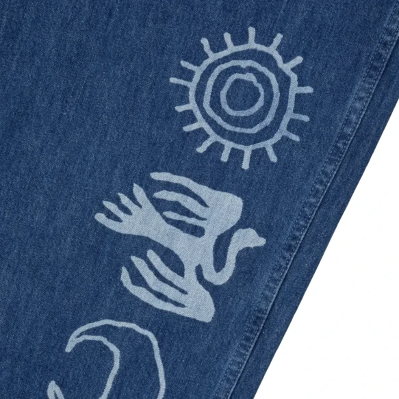 Heresy Primitive Jeans print detail in a white background