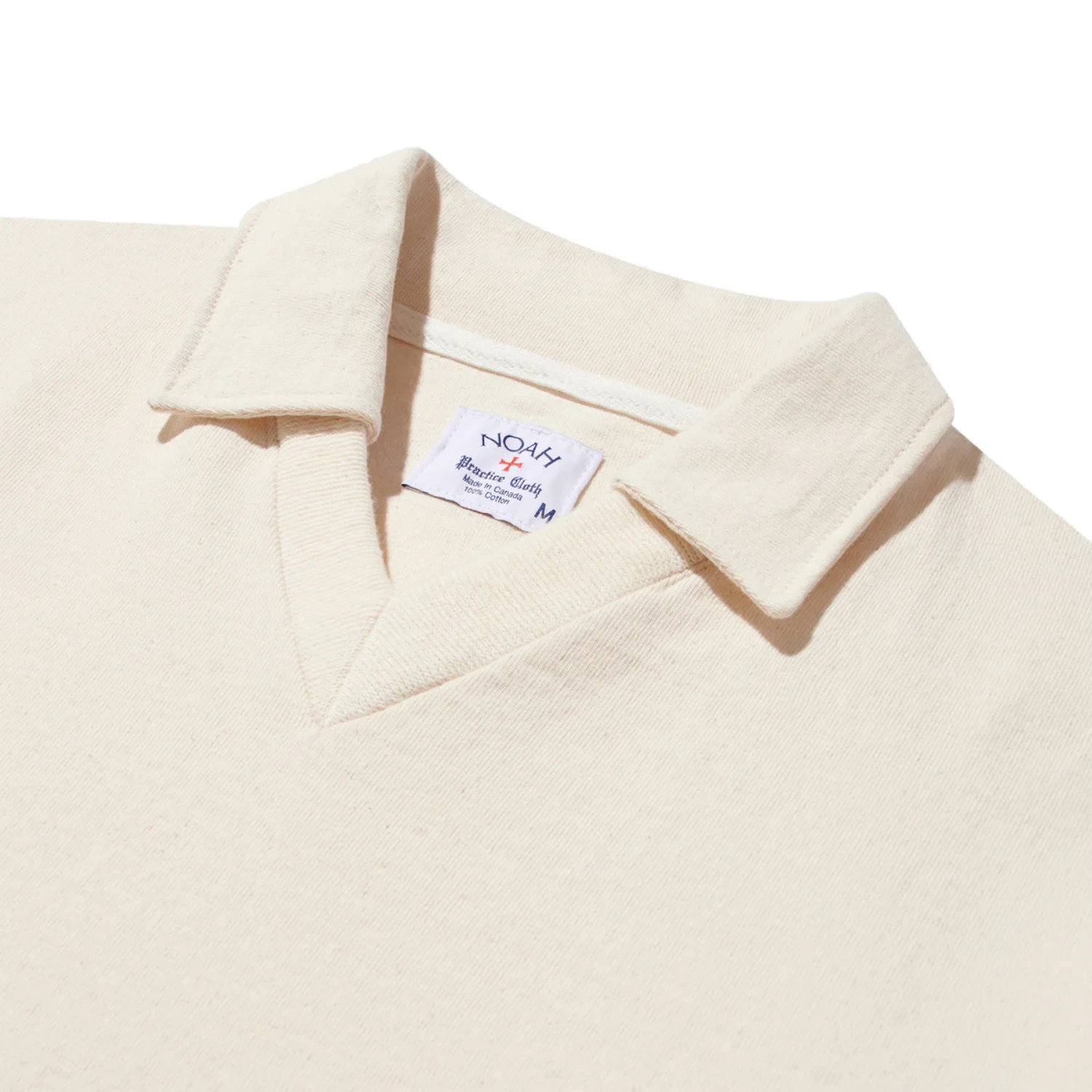 Noah Pitch Practice Top Ivory front view collar detail in a white background