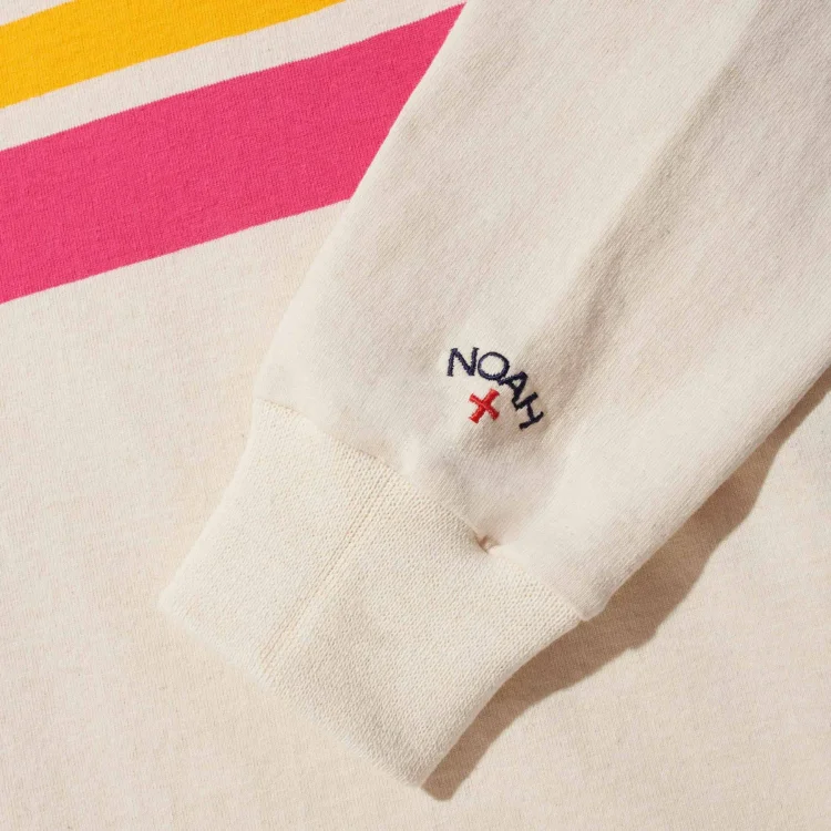 Noah Pitch Practice Top Ivory front view cuff detail in a white background