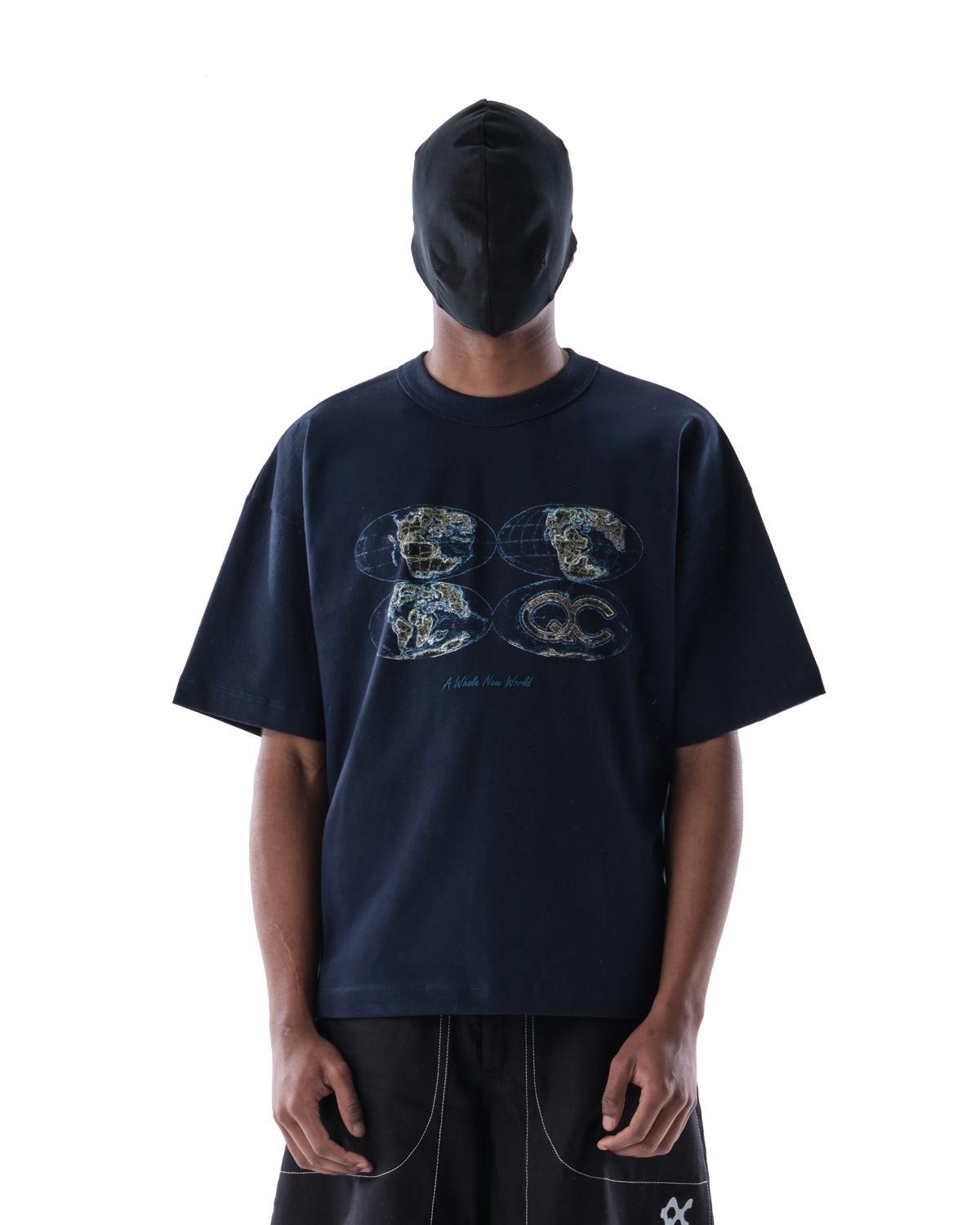 Close view from the front of a person wearing the Quadro Creations Pangea T-Shirt.