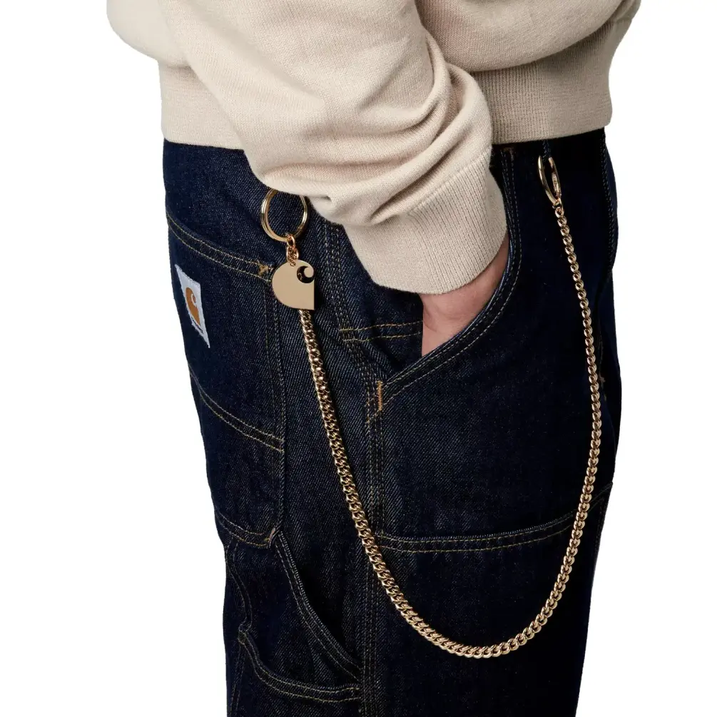 Carhartt WIP Cuban Link Keychain Gold on model in a white background