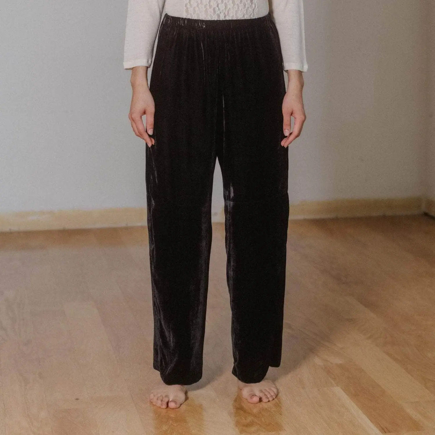 Baserange Olin Pants Black front view close-up on model