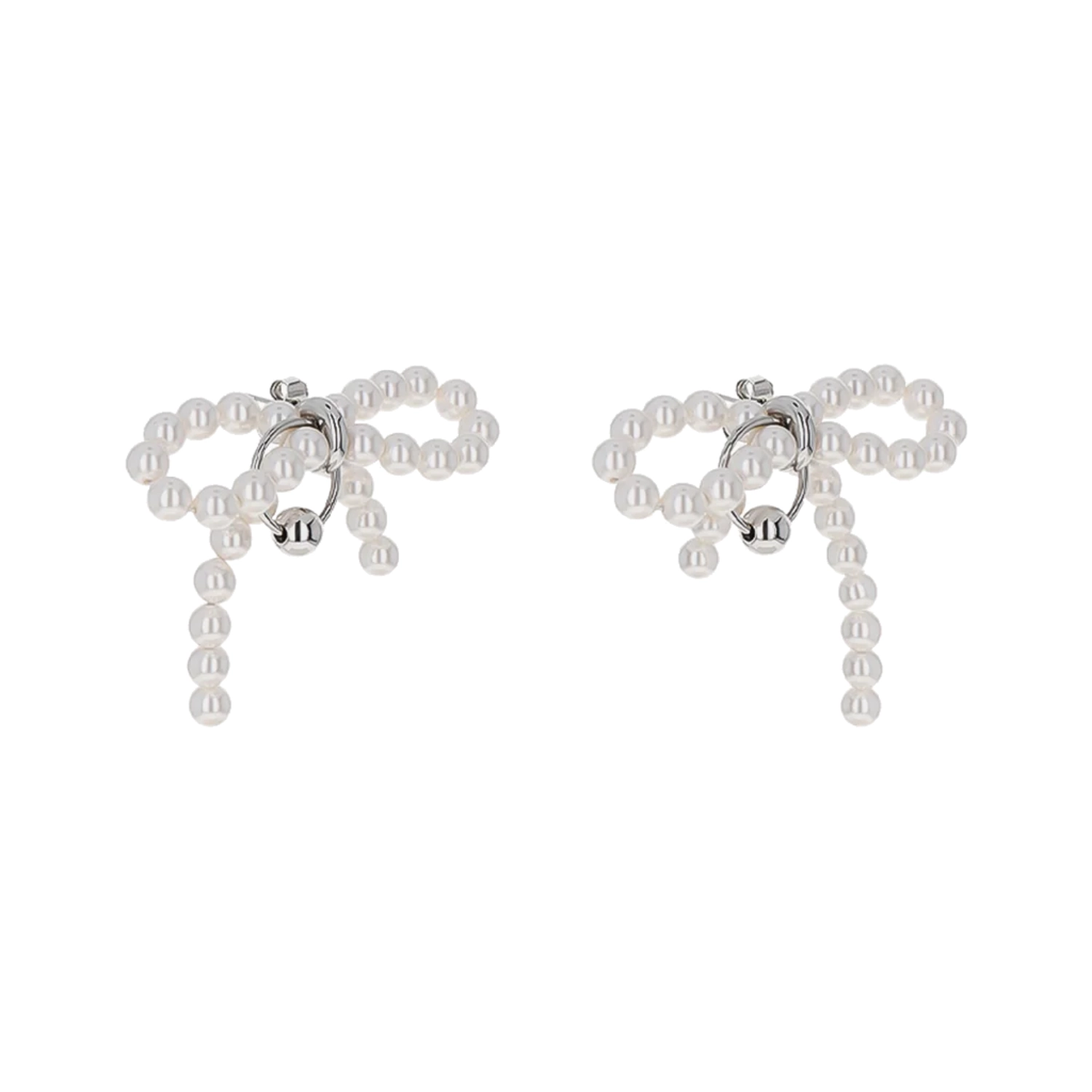 Justine Clenquet Sheena Earrings in a white background