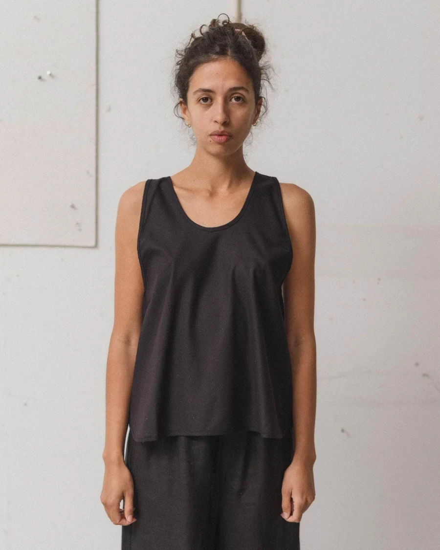 Baserange Apron Top Black front view on model
