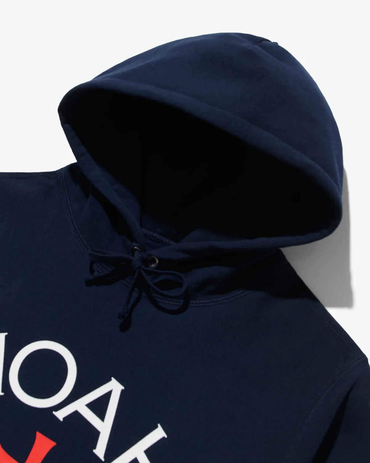 Noah Core Logo Hoodie Navy front view hood detail in a white background