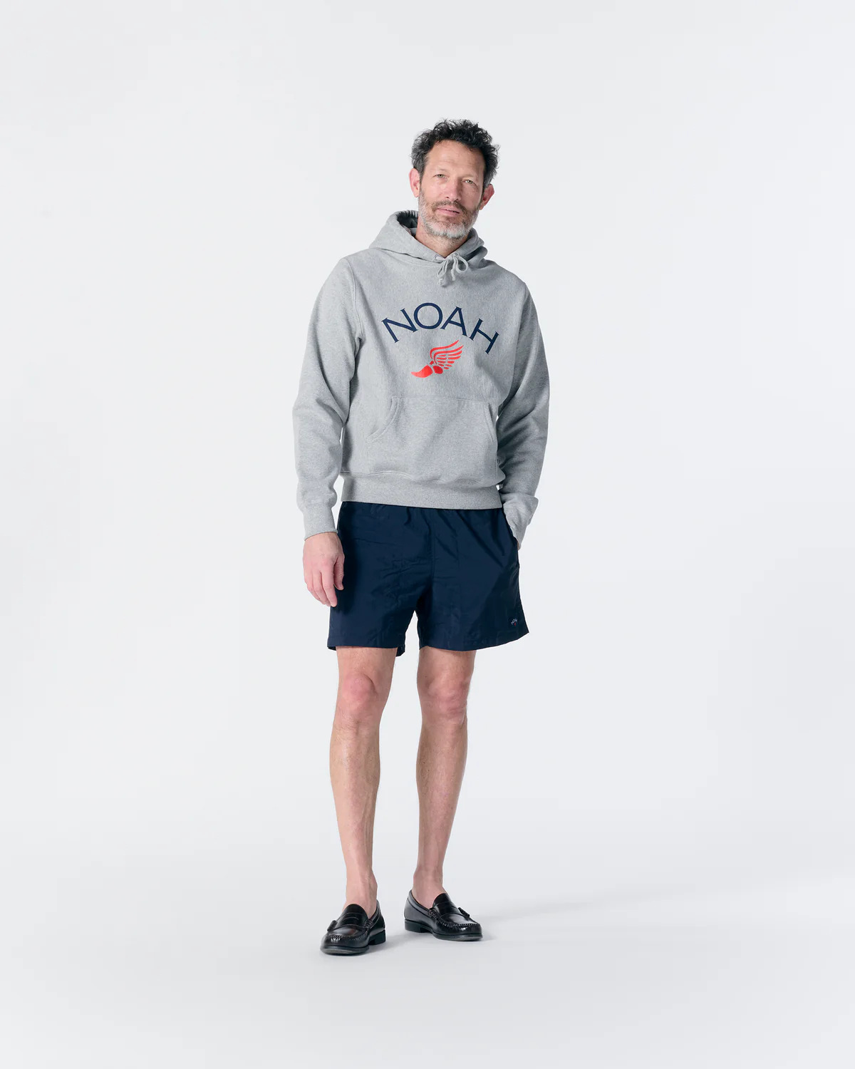 Noah Winged Foot Logo Hoodie Heather Grey front view on model
